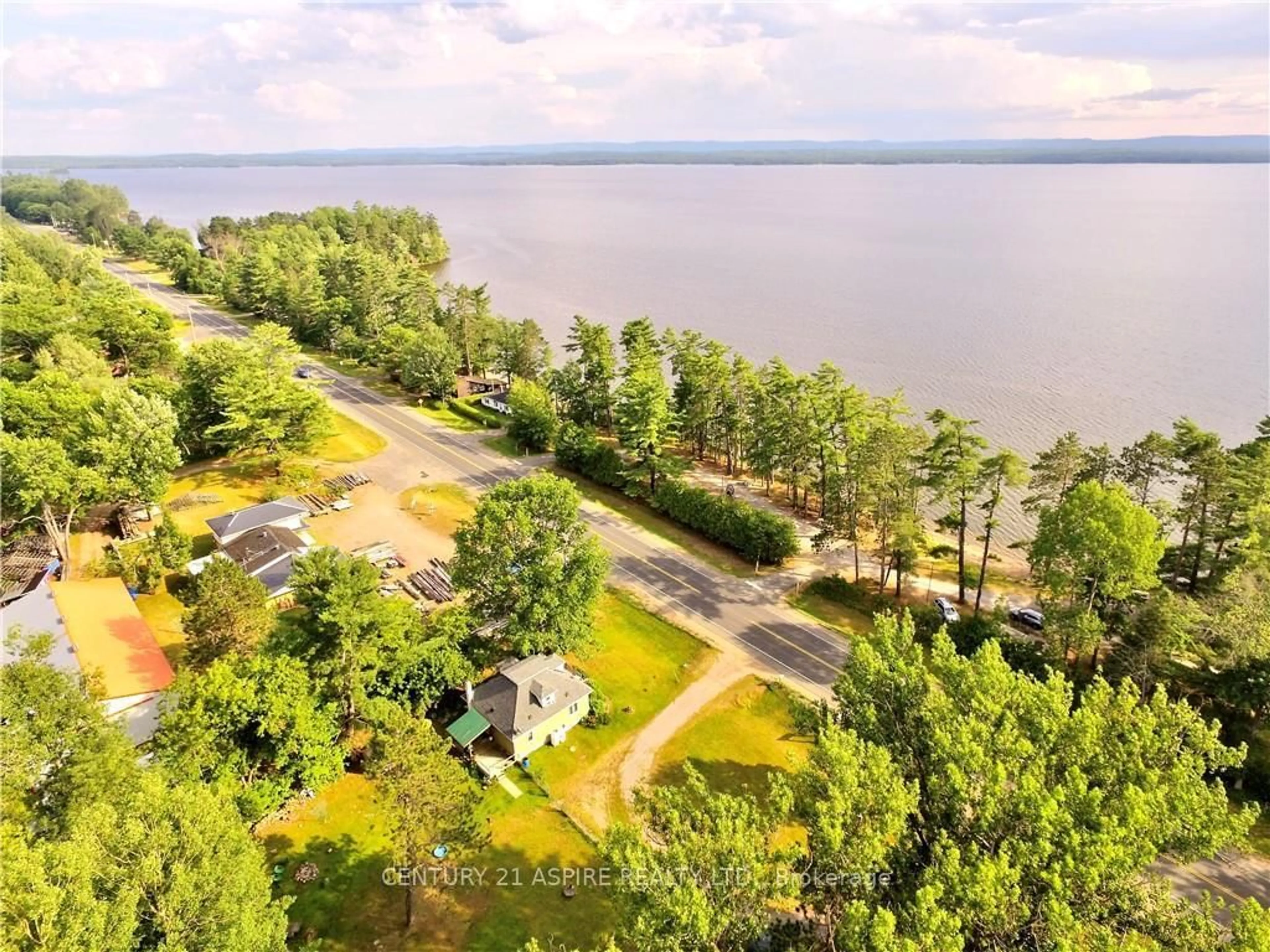 A pic from outside/outdoor area/front of a property/back of a property/a pic from drone, water/lake/river/ocean view for 13314 60 Highway, Golden Lake Ontario K0J 1X0
