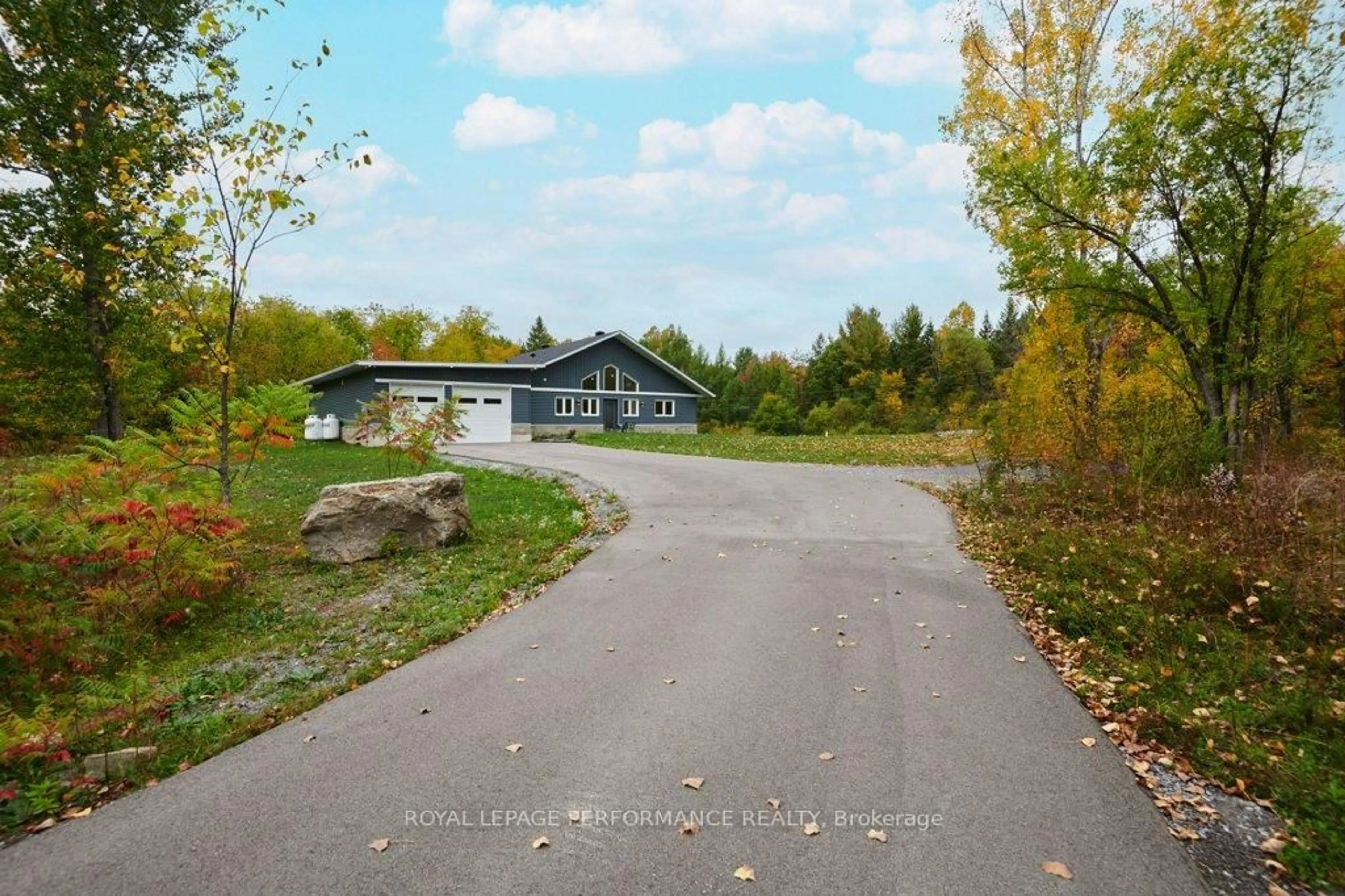 A pic from outside/outdoor area/front of a property/back of a property/a pic from drone, street for 1797 March Rd, Carp Ontario K0A 1L0