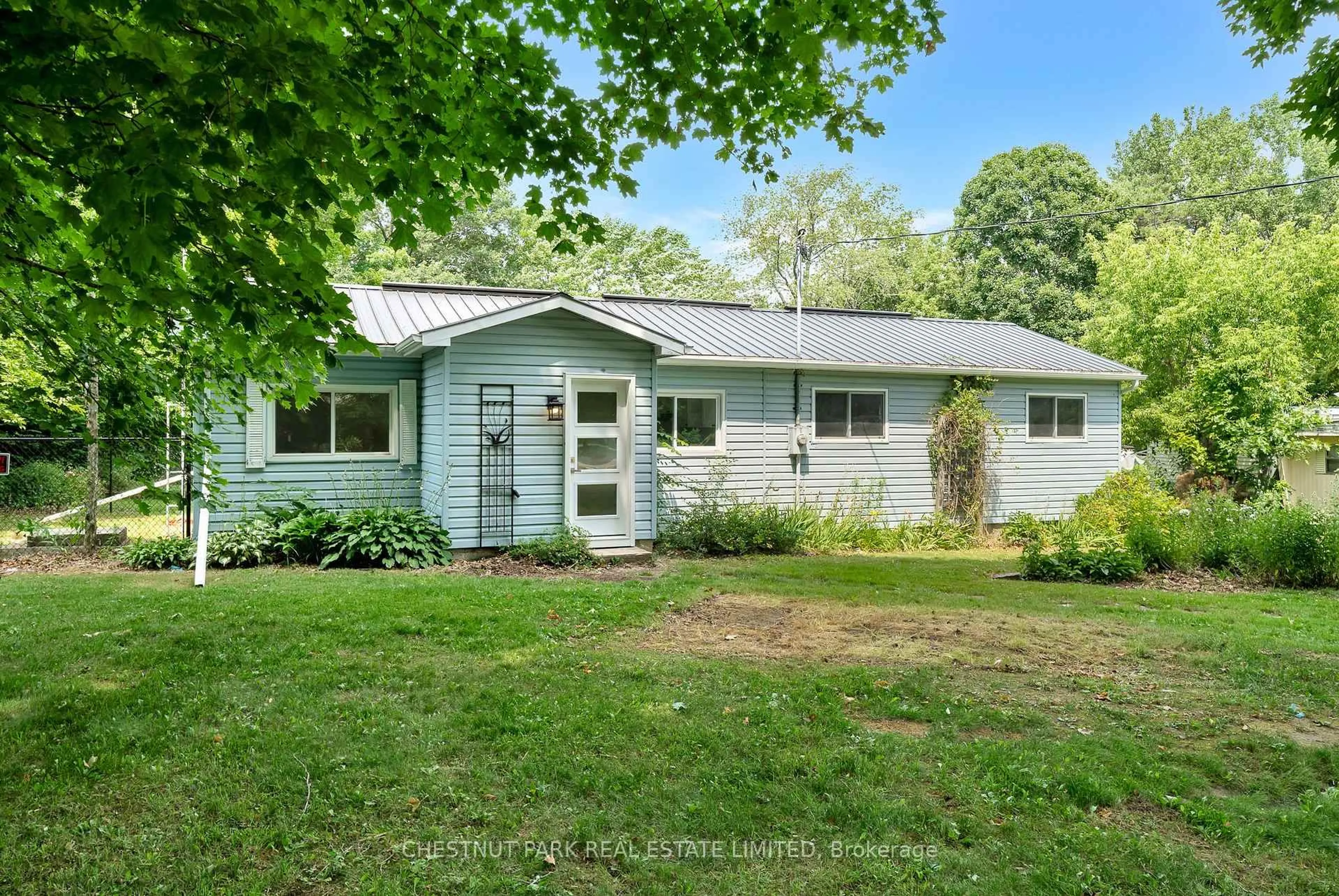 Home with vinyl exterior material, street for 976 County Rd 13, Prince Edward County Ontario K0K 2P0