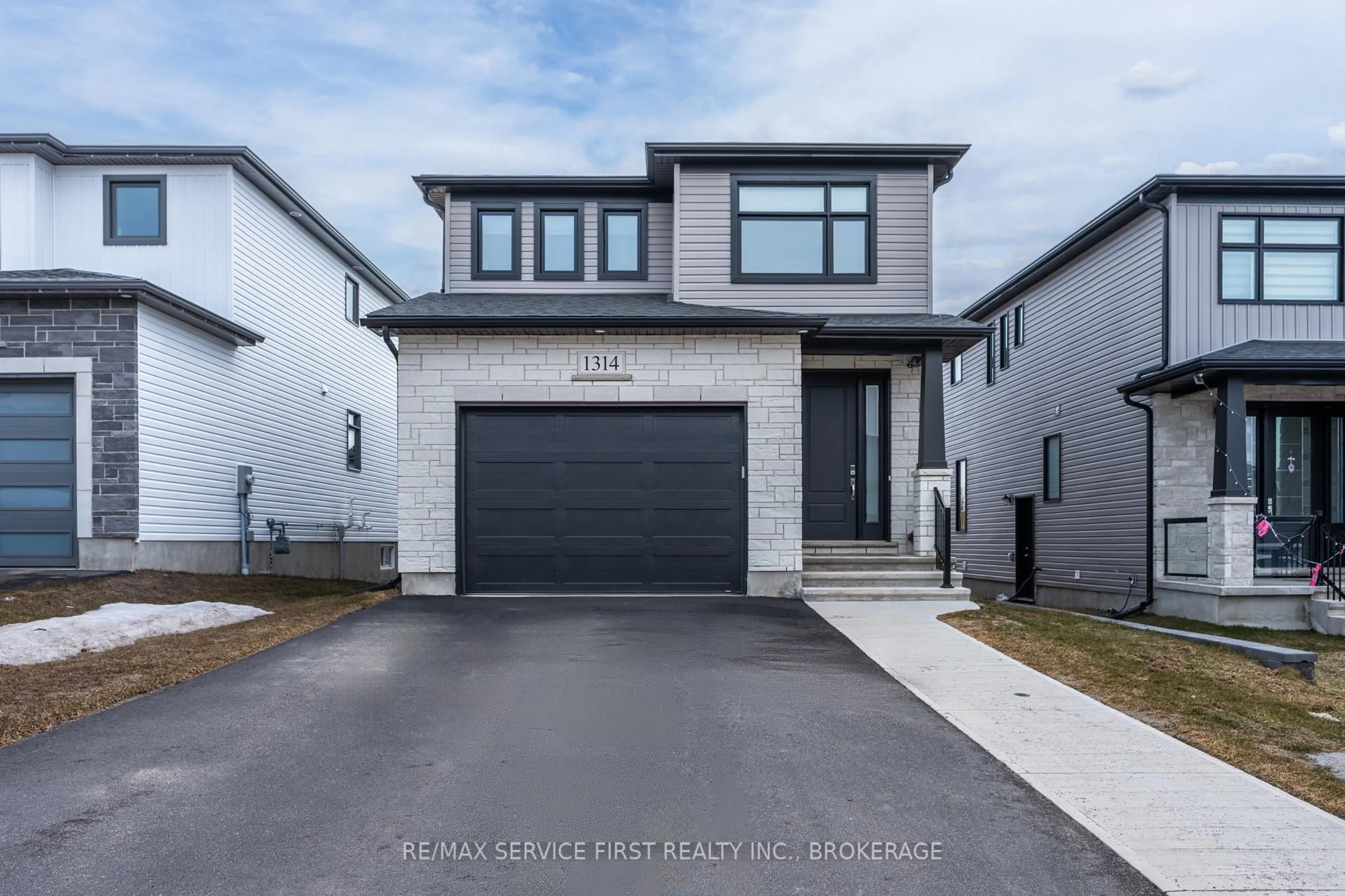 Home with brick exterior material, street for 1314 Turnbull Way, Kingston Ontario K7P 0T3