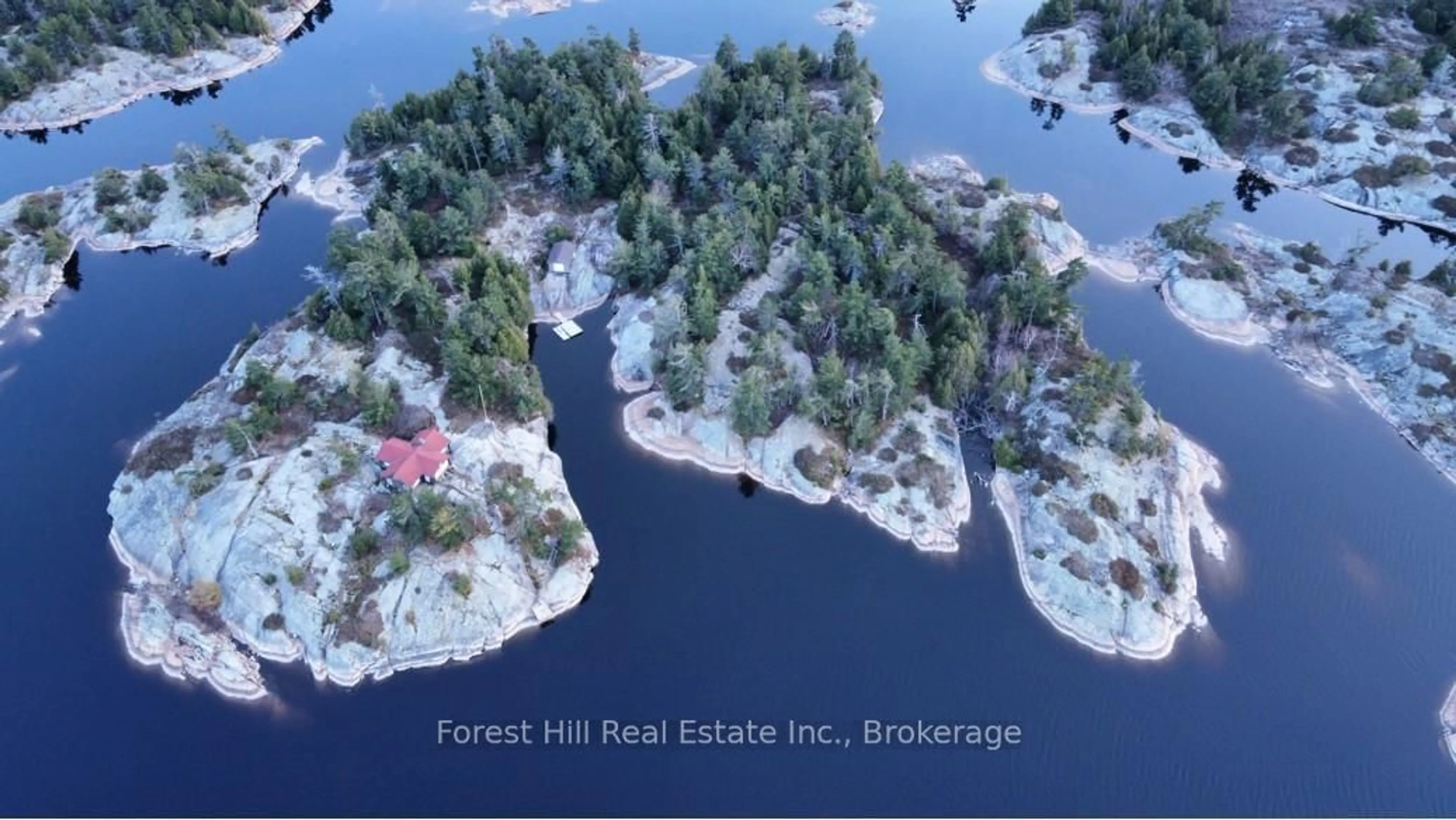 A pic from outside/outdoor area/front of a property/back of a property/a pic from drone, forest/trees view for 1 Cash Island D328 Island, Parry Sound Remote Area Ontario P0G 0A2