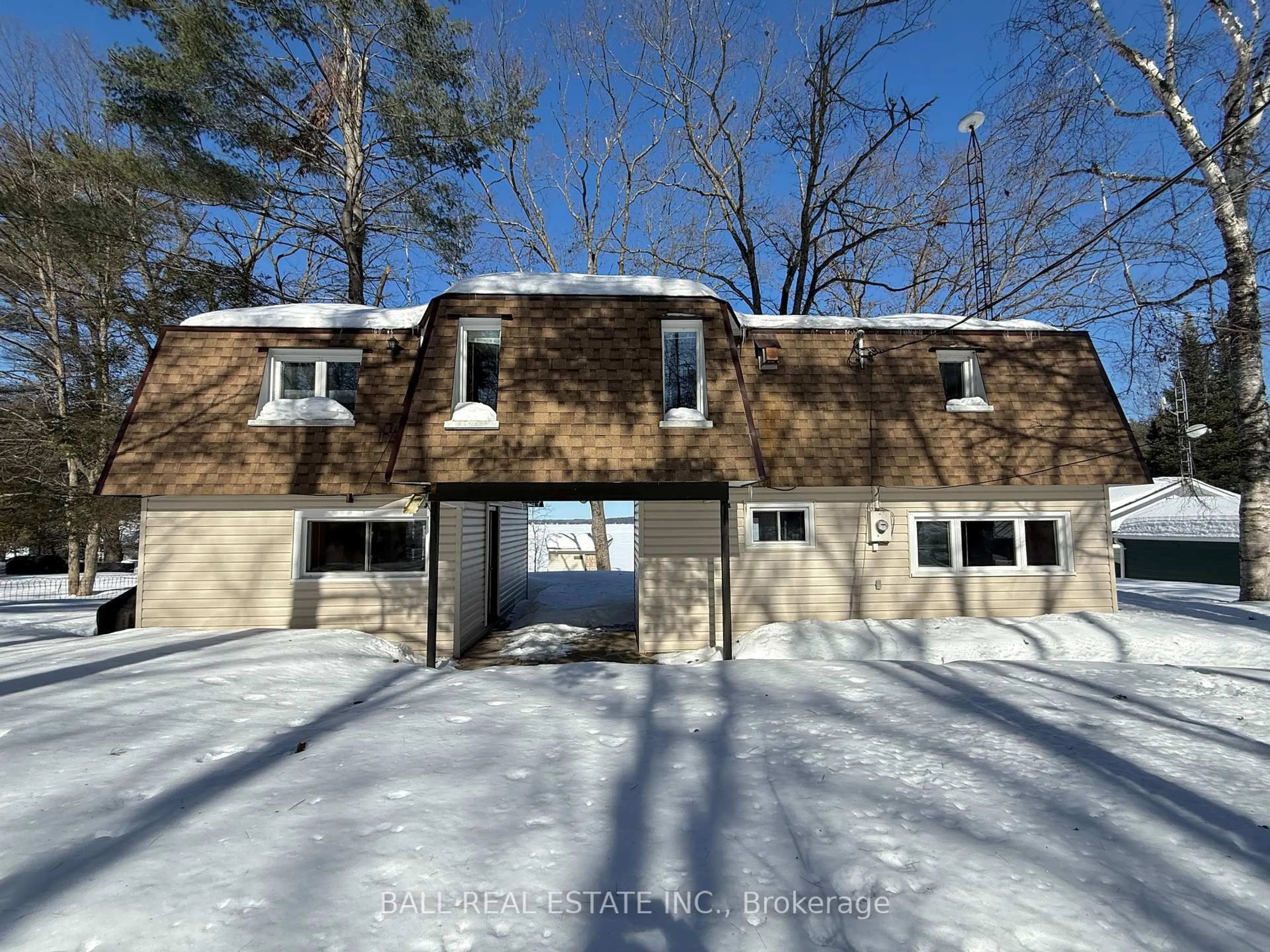 A pic from outside/outdoor area/front of a property/back of a property/a pic from drone, street for 10 Fire Route 133A, Trent Lakes Ontario K0L 1J0