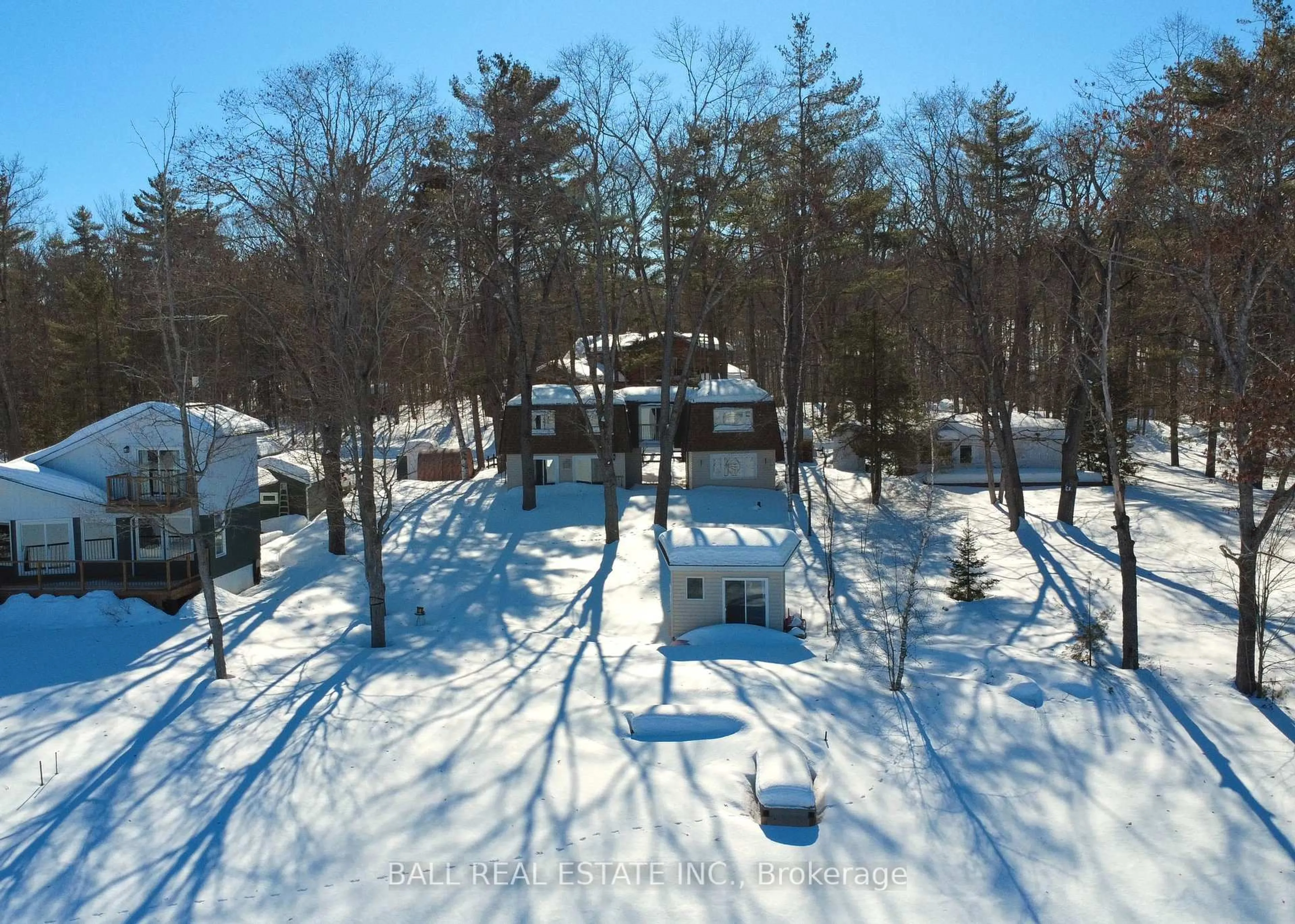 A pic from outside/outdoor area/front of a property/back of a property/a pic from drone, forest/trees view for 10 Fire Route 133A, Trent Lakes Ontario K0L 1J0