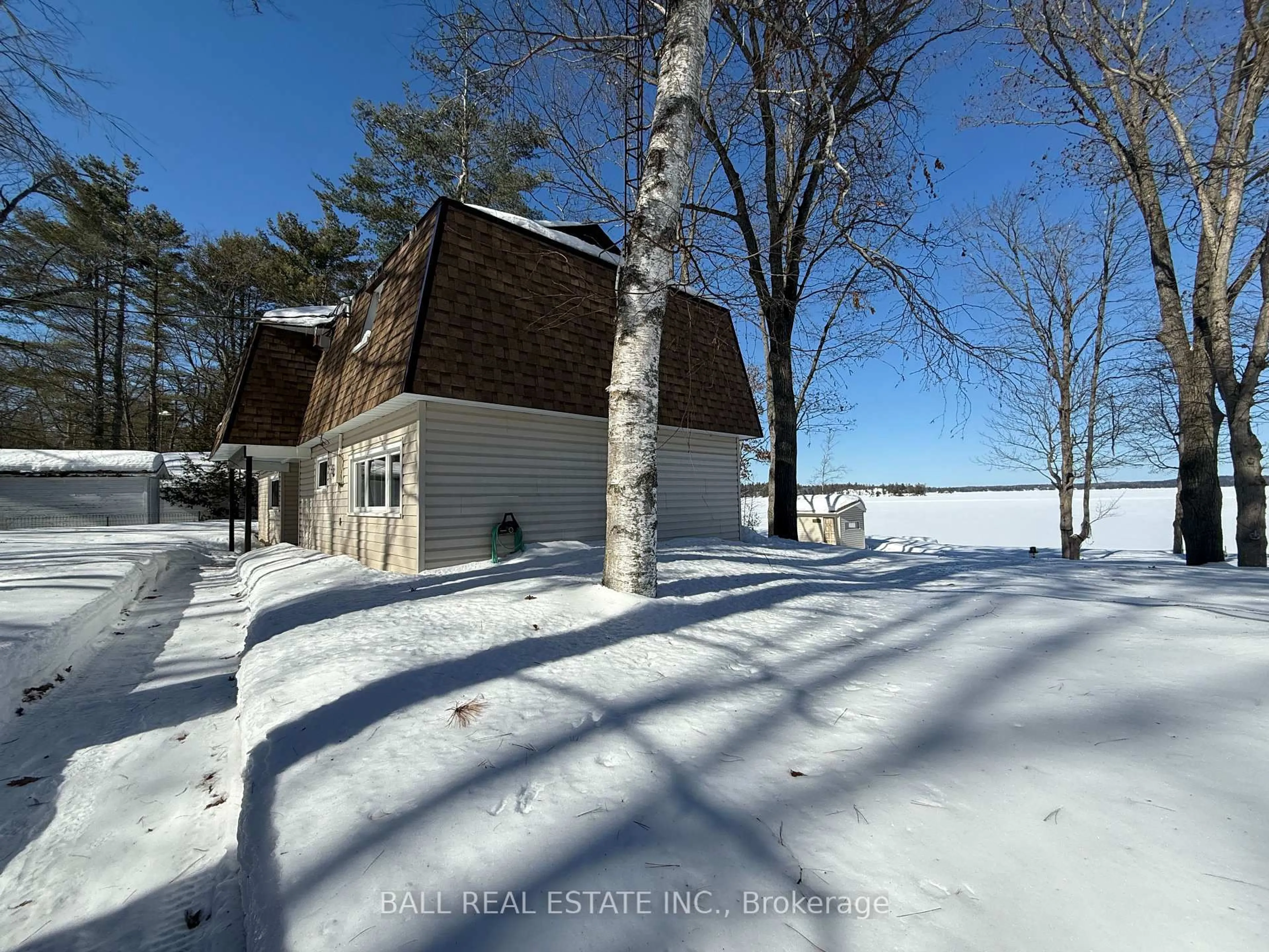 A pic from outside/outdoor area/front of a property/back of a property/a pic from drone, water/lake/river/ocean view for 10 Fire Route 133A, Trent Lakes Ontario K0L 1J0