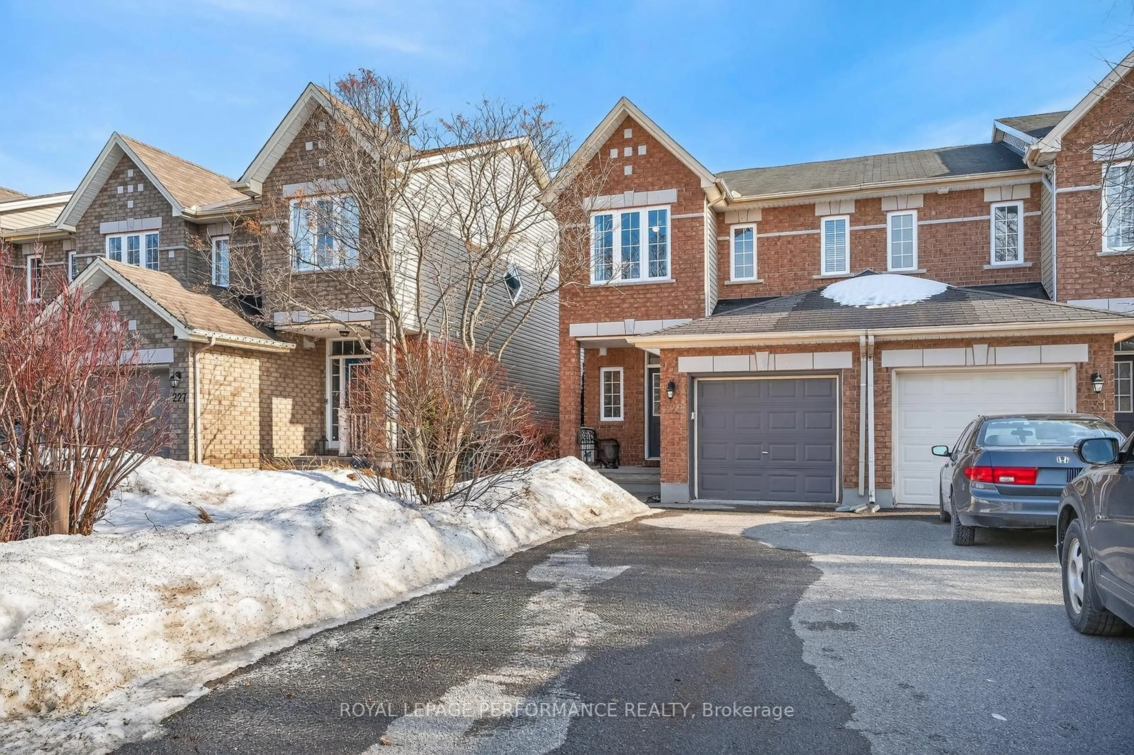 Home with brick exterior material, street for 229 Saddlesmith Circ, Ottawa Ontario K2M 2Z1