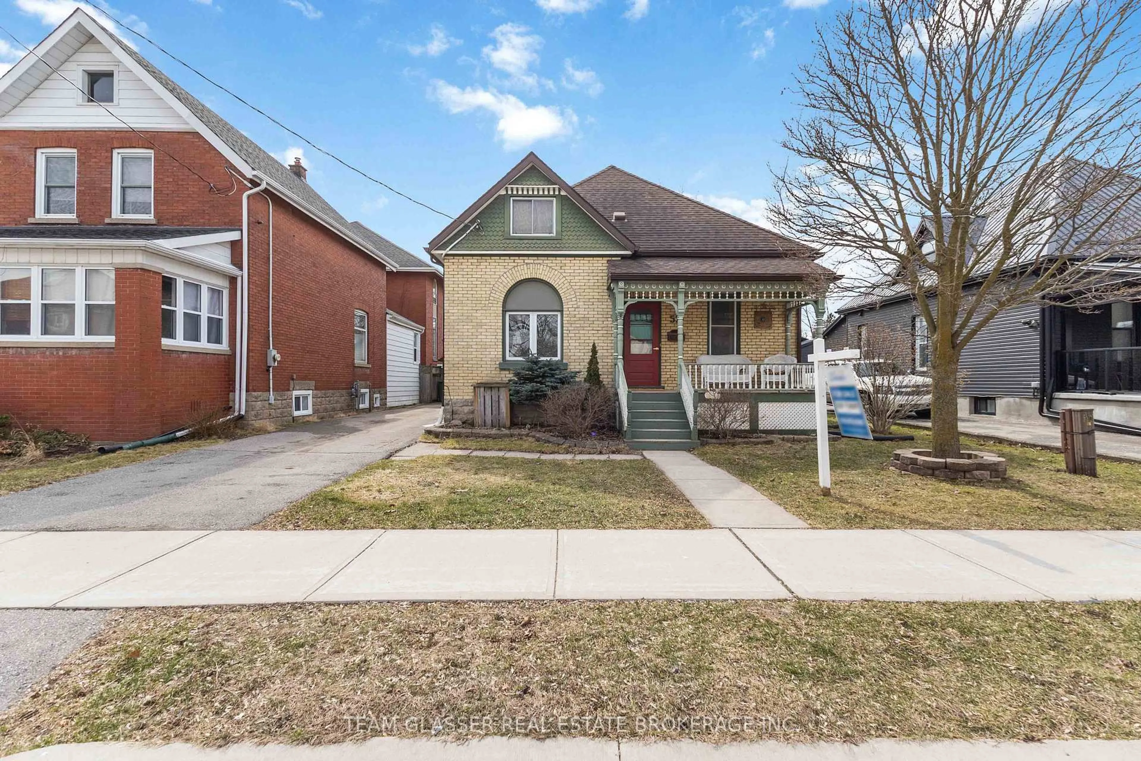 Home with brick exterior material, street for 57 LOCUST St, St. Thomas Ontario N5R 2C2