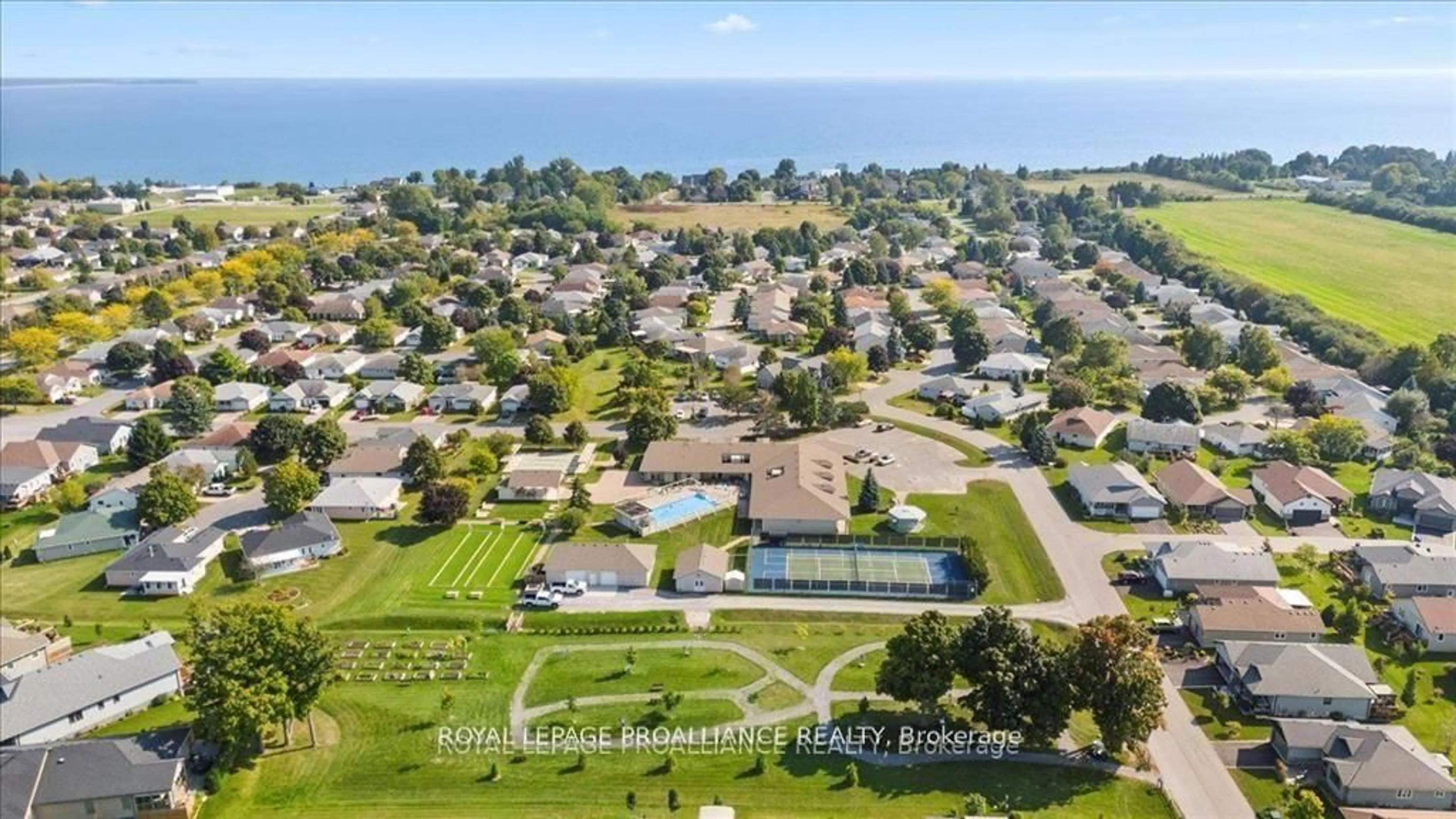 A pic from outside/outdoor area/front of a property/back of a property/a pic from drone, water/lake/river/ocean view for 71 Dorchester Dr, Prince Edward County Ontario K0K 3L0