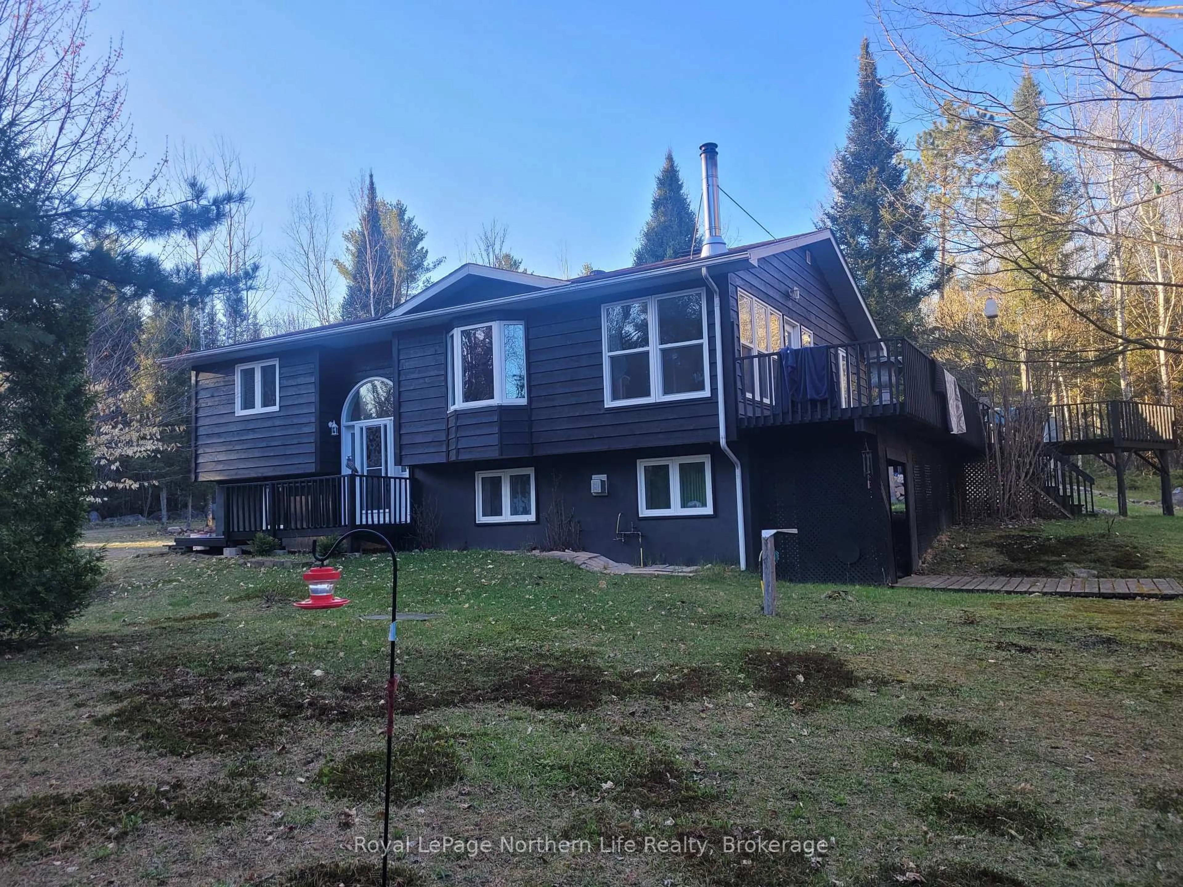 A pic from outside/outdoor area/front of a property/back of a property/a pic from drone, unknown for 3221 Highway 17, Papineau-Cameron Ontario P0H 1V0