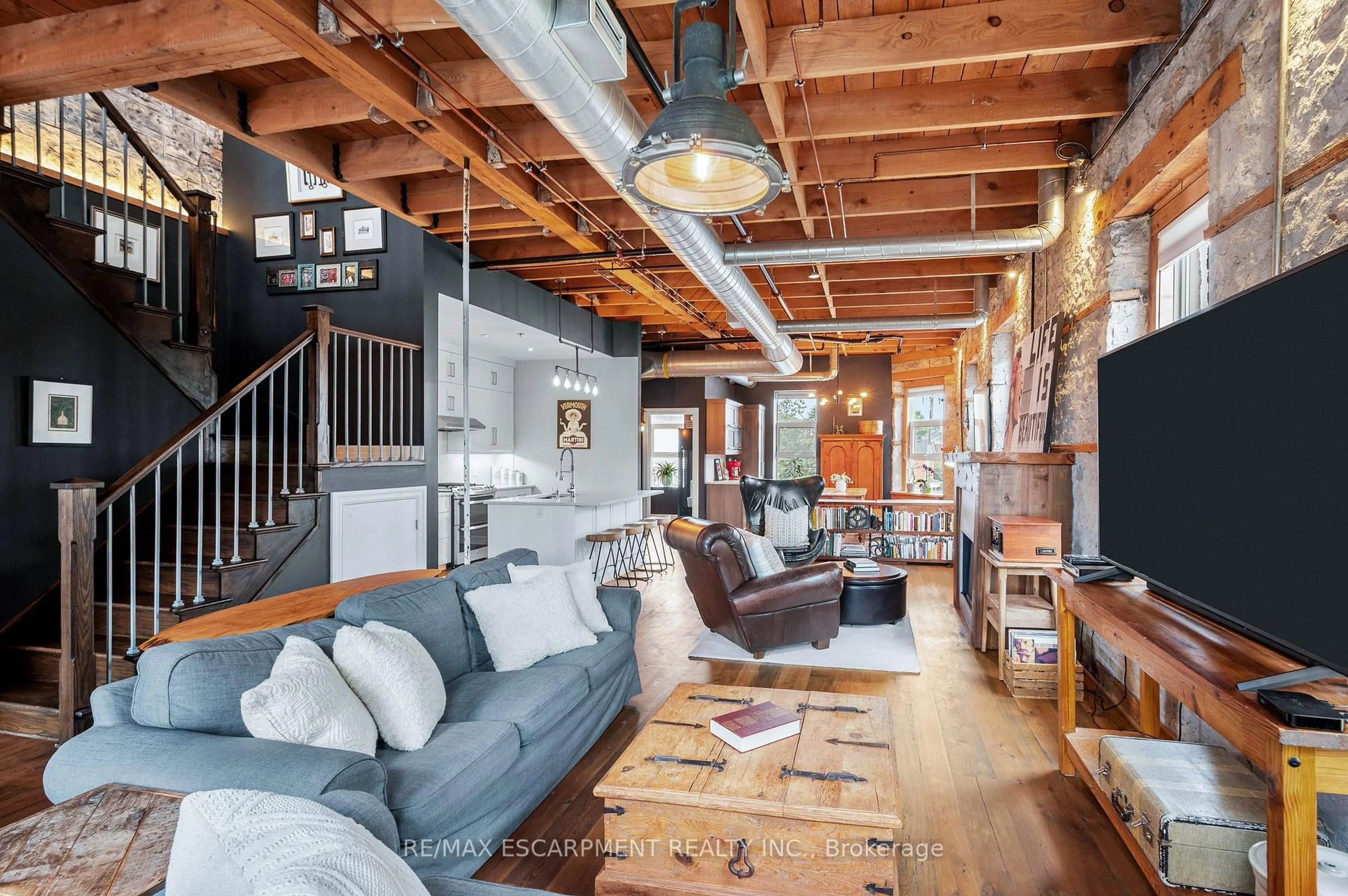 Living room with furniture, cement floor for 25 Concession St #201, Cambridge Ontario N1R 2G6