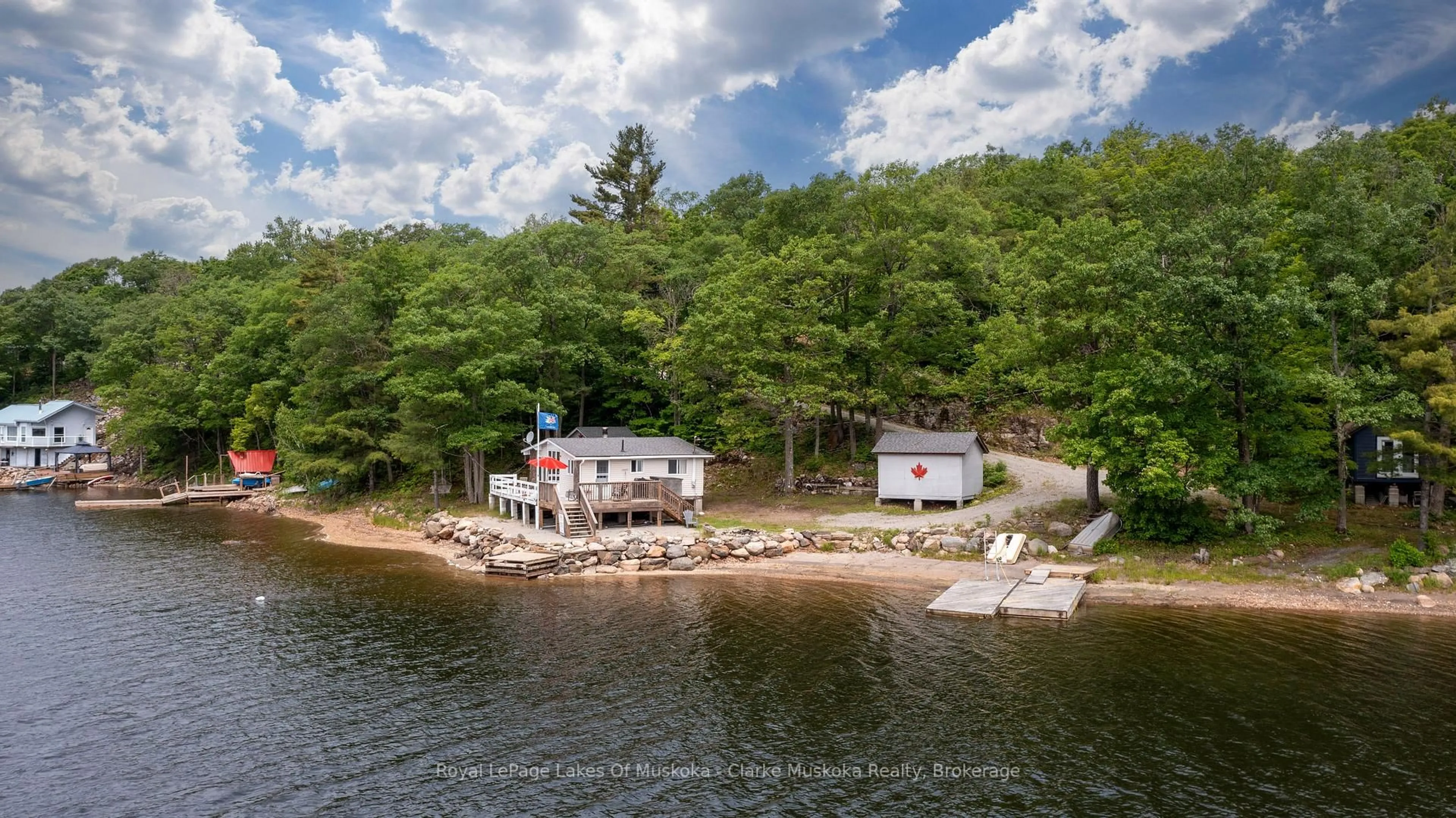 A pic from outside/outdoor area/front of a property/back of a property/a pic from drone, water/lake/river/ocean view for 709 Harrison Tr, Georgian Bay Ontario L0K 1S0