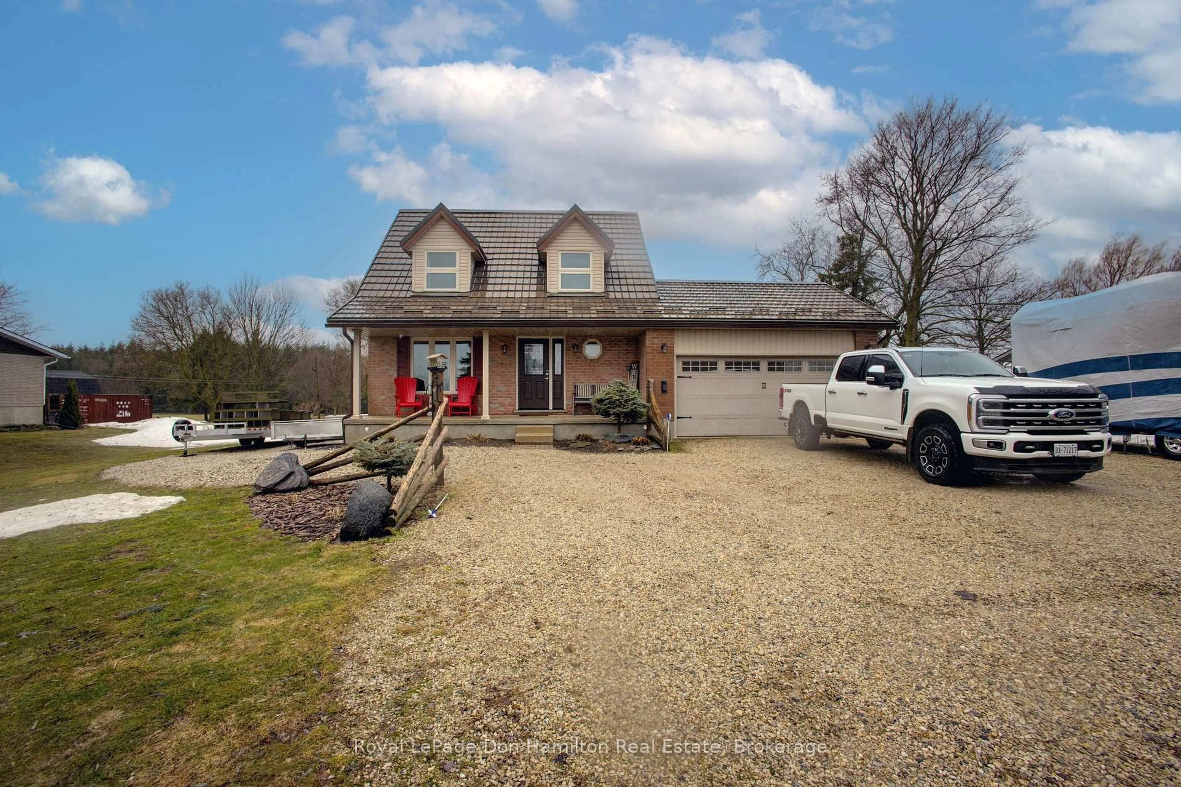 A pic from outside/outdoor area/front of a property/back of a property/a pic from drone, unknown for 7442 Road 164 Rd, North Perth Ontario N0G 1B0