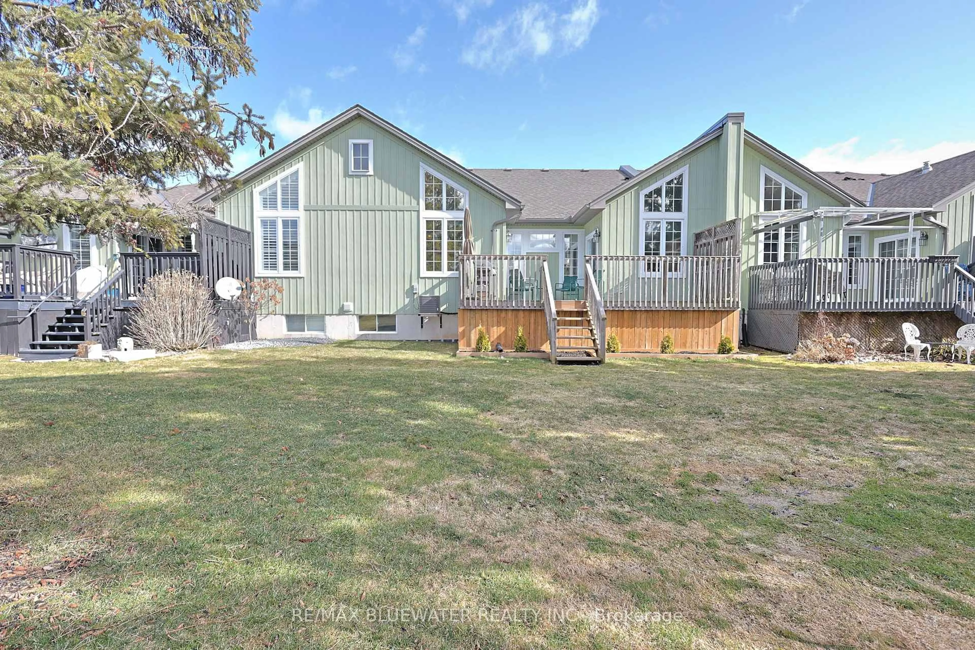 A pic from outside/outdoor area/front of a property/back of a property/a pic from drone, unknown for 13 Oakwood Links Lane, South Huron Ontario N0M 1T0