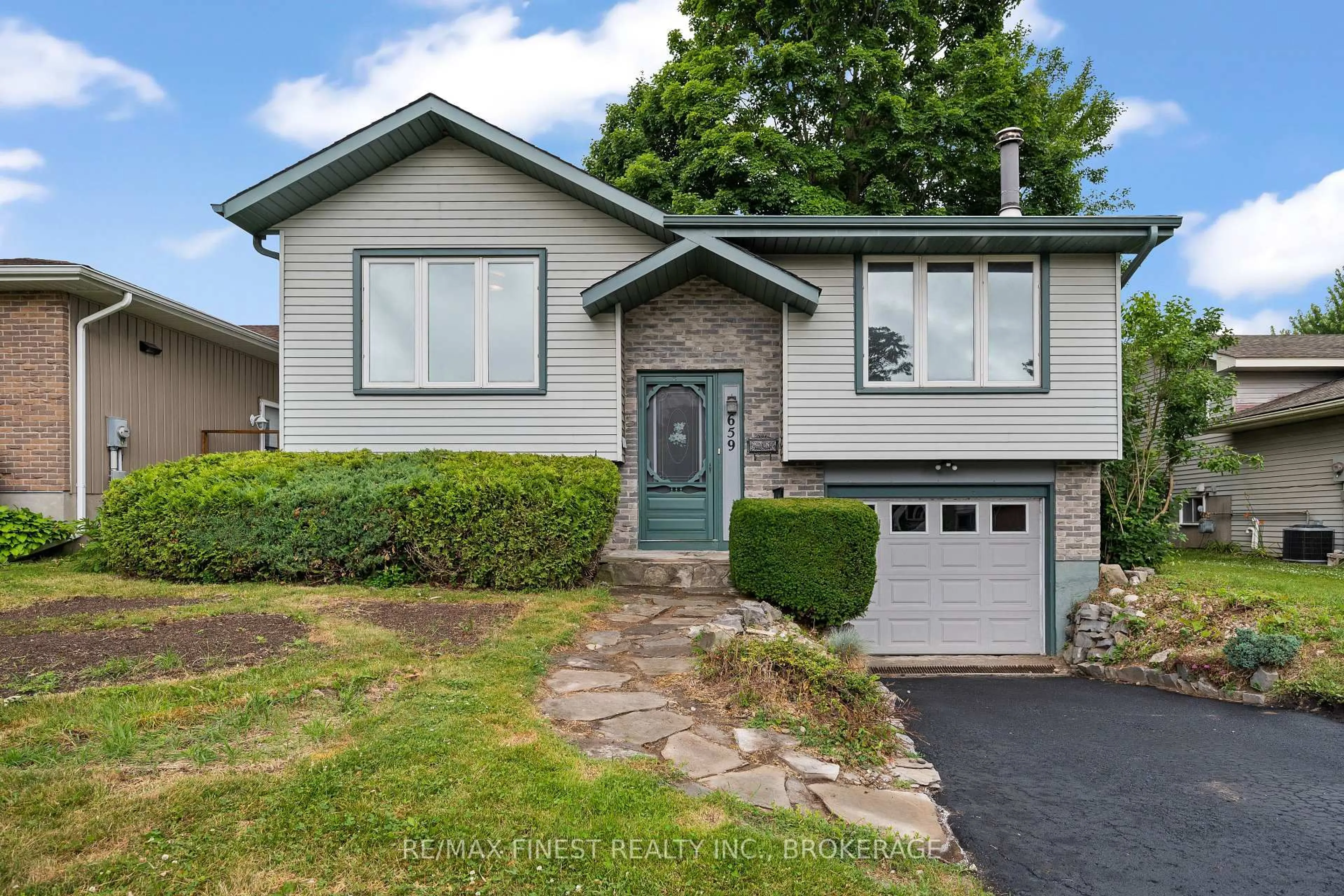 Home with vinyl exterior material, street for 659 Truedell Rd, Kingston Ontario K7M 6W6