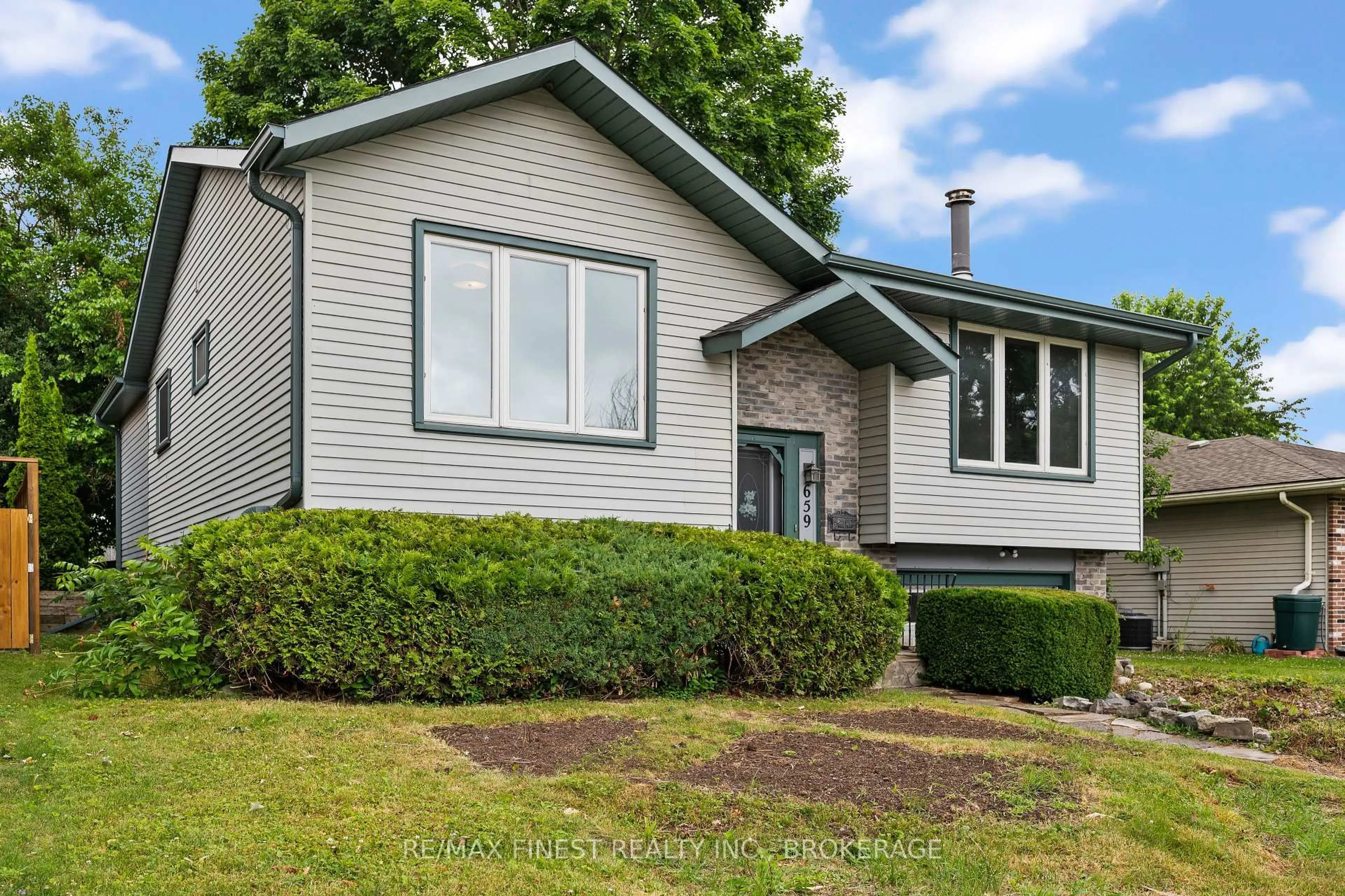 Home with vinyl exterior material, street for 659 Truedell Rd, Kingston Ontario K7M 6W6