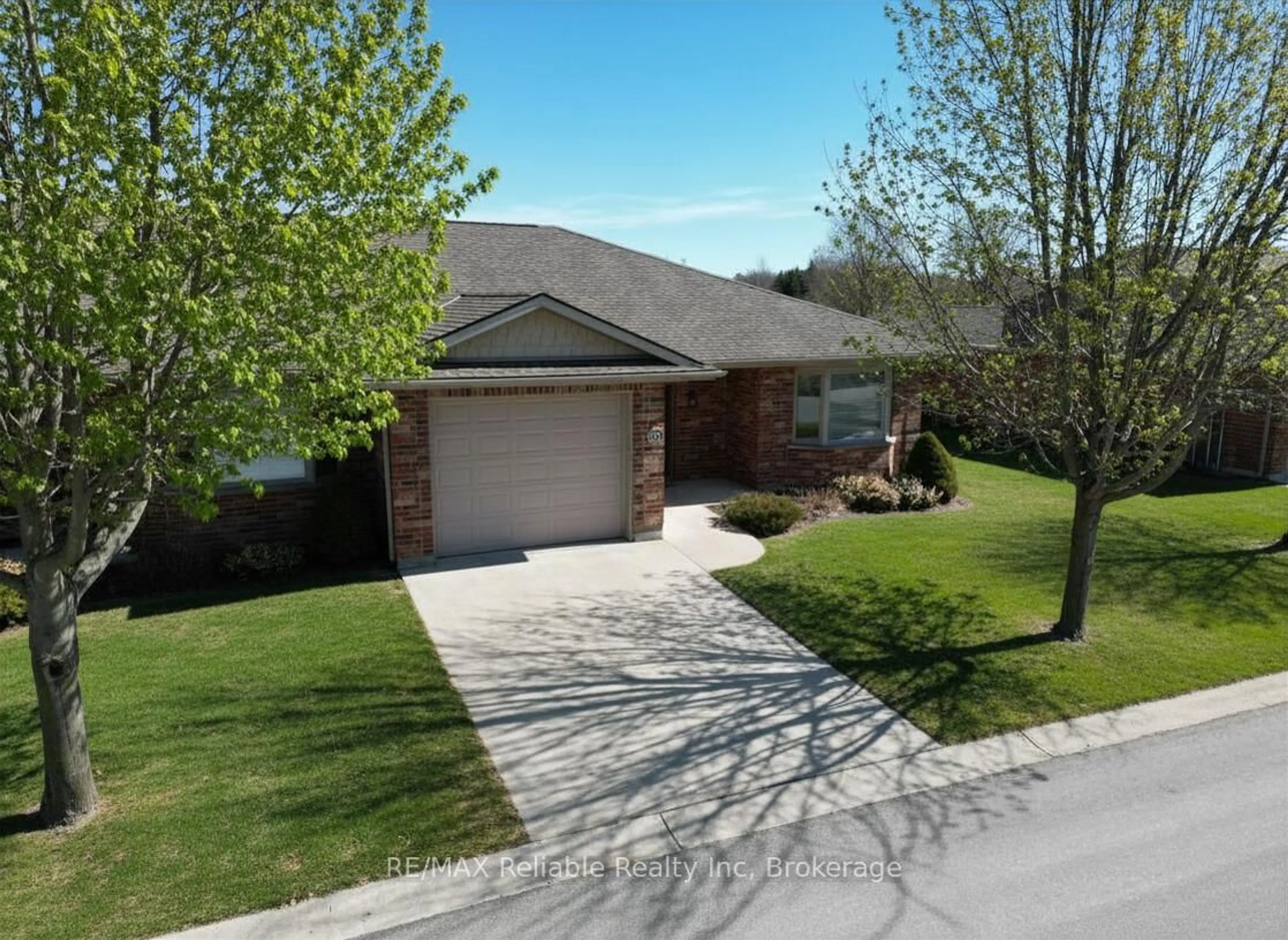 Home with brick exterior material, street for 15 Bayfield Mews Lane, Bluewater Ontario N0M 1G0