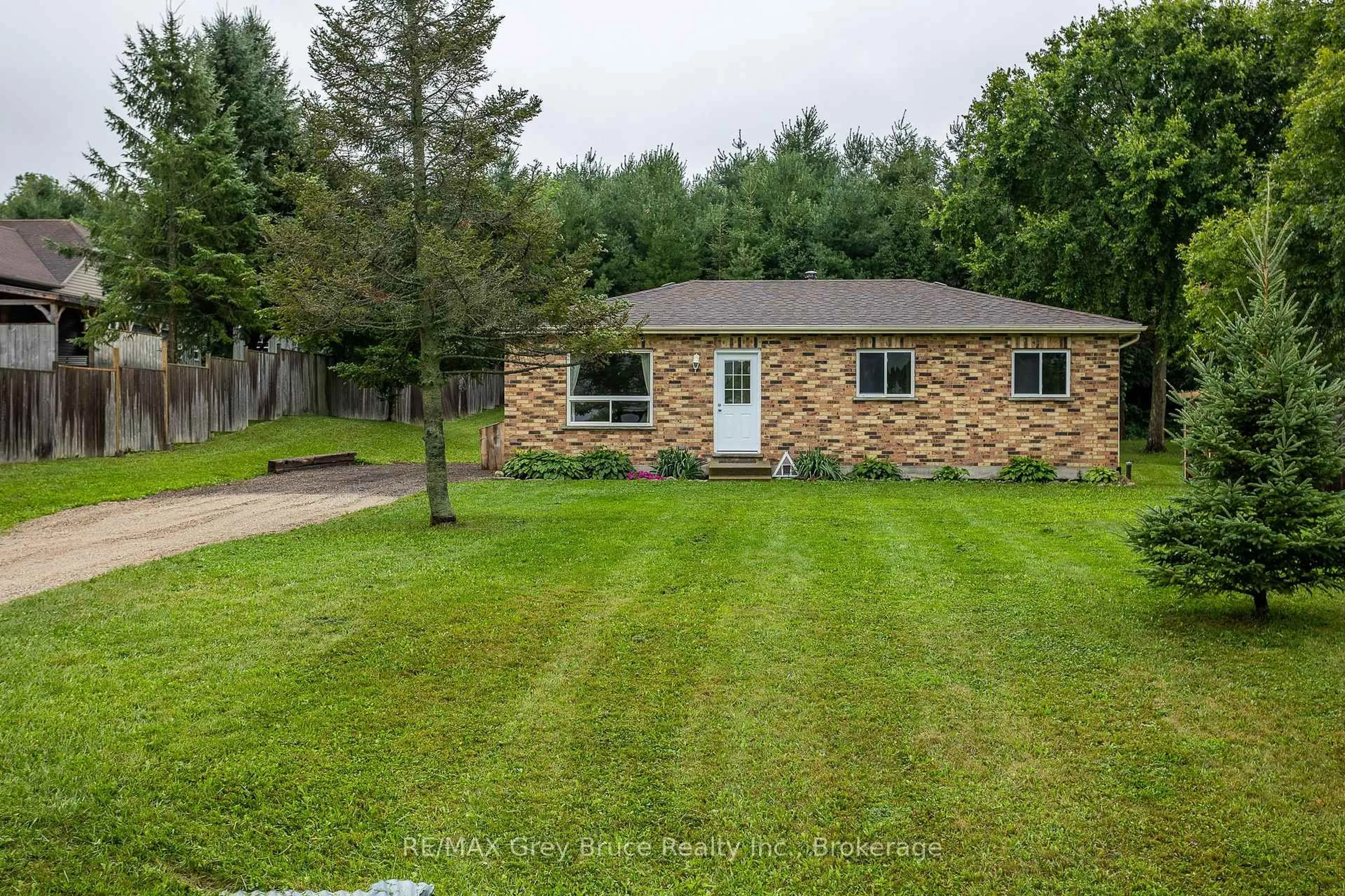 A pic from outside/outdoor area/front of a property/back of a property/a pic from drone, street for 101530 Side Road 9, Georgian Bluffs Ontario N0H 2N0