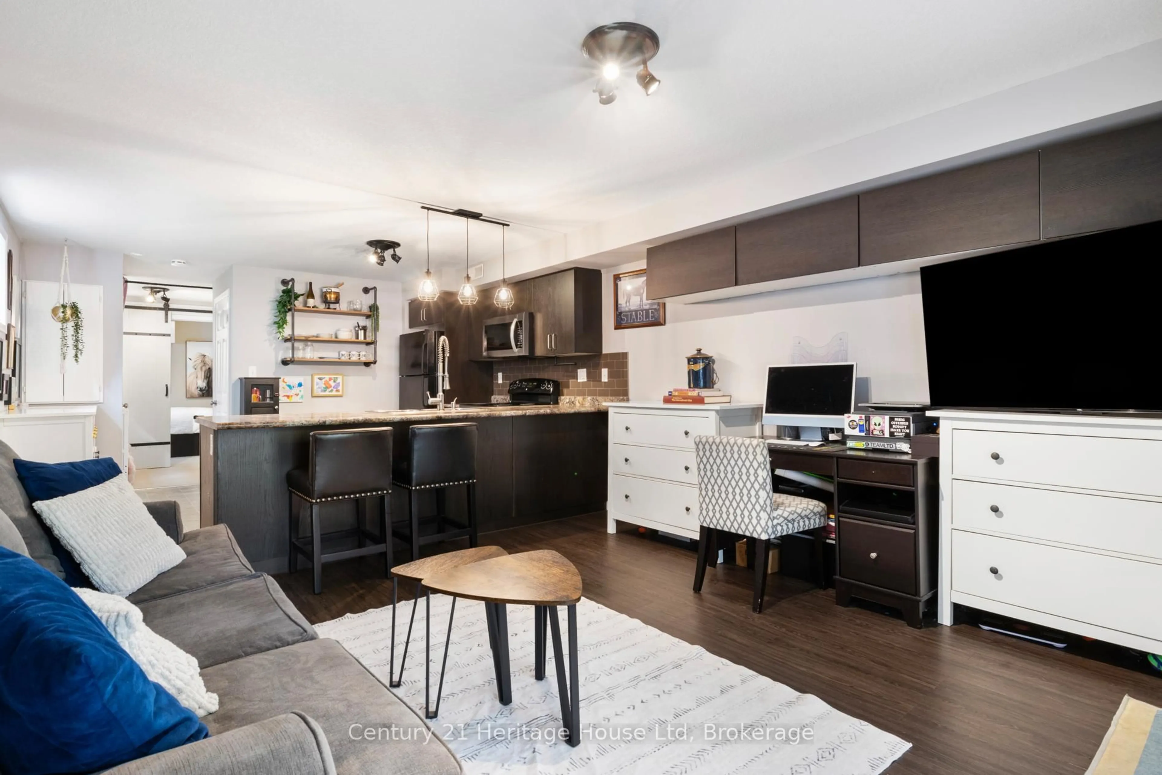 Open concept kitchen, wood/laminate floor for 35 Mountford Dr #56, Guelph Ontario N1E 0G6