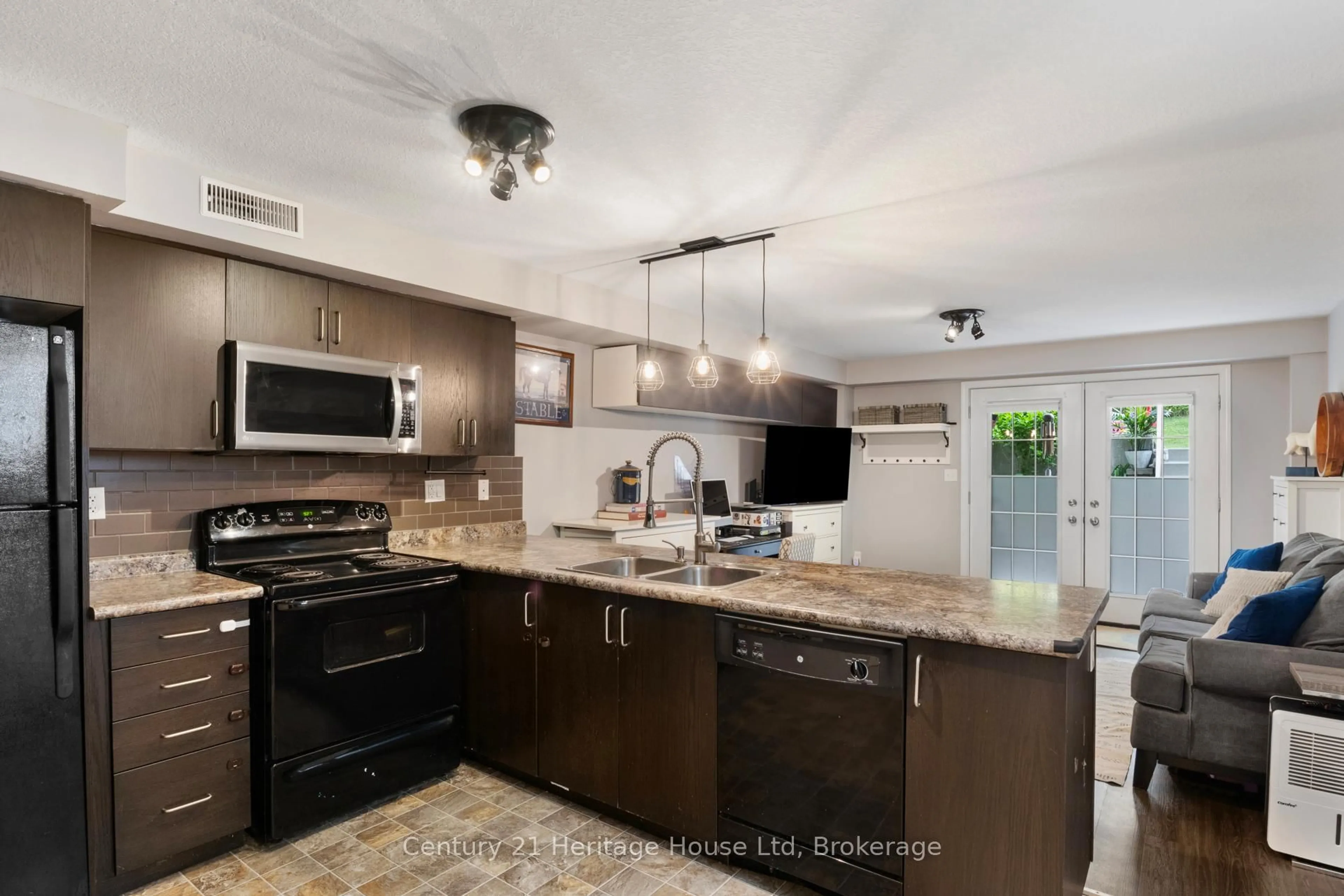 Open concept kitchen, ceramic/tile floor for 35 Mountford Dr #56, Guelph Ontario N1E 0G6