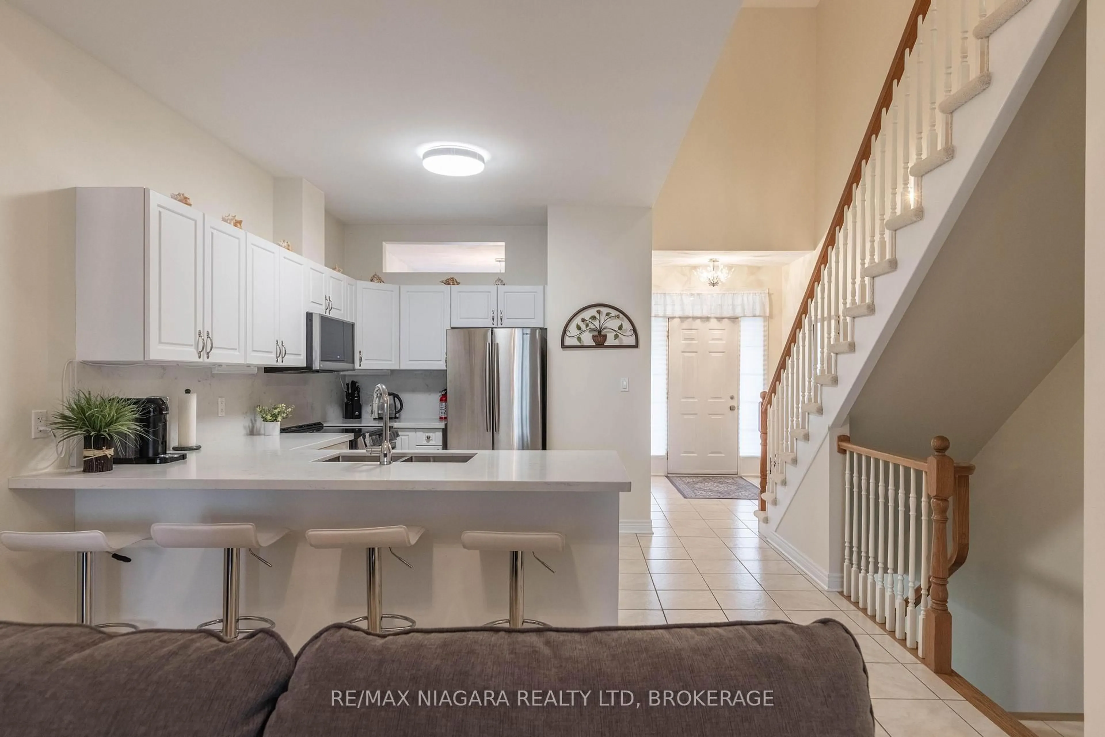 Open concept kitchen, ceramic/tile floor for 8142 Costabile Dr #13, Niagara Falls Ontario L2H 3M3