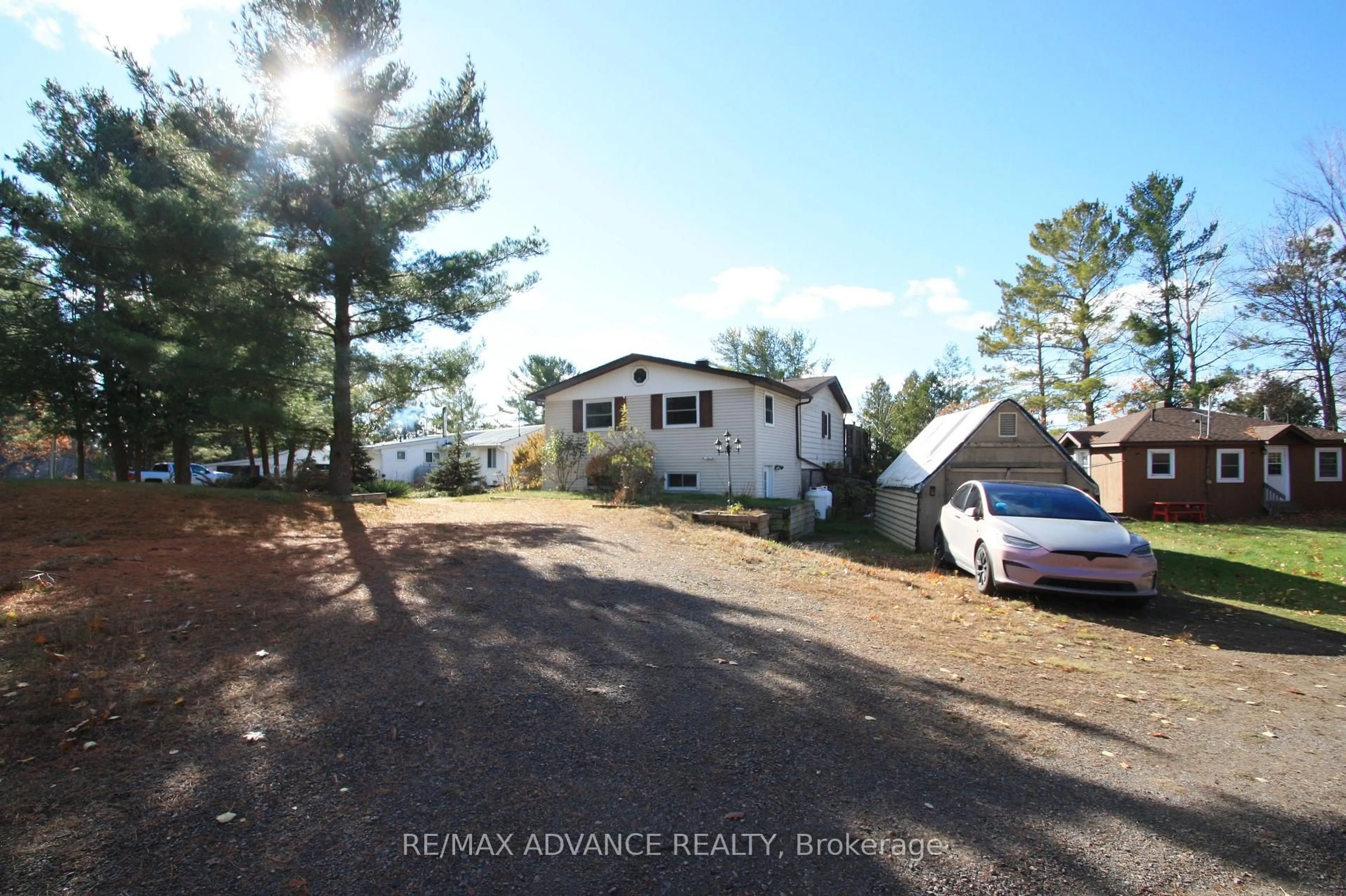 A pic from outside/outdoor area/front of a property/back of a property/a pic from drone, water/lake/river/ocean view for 77 ROCKVIEW Rd, Nipissing Ontario P0H 1H0