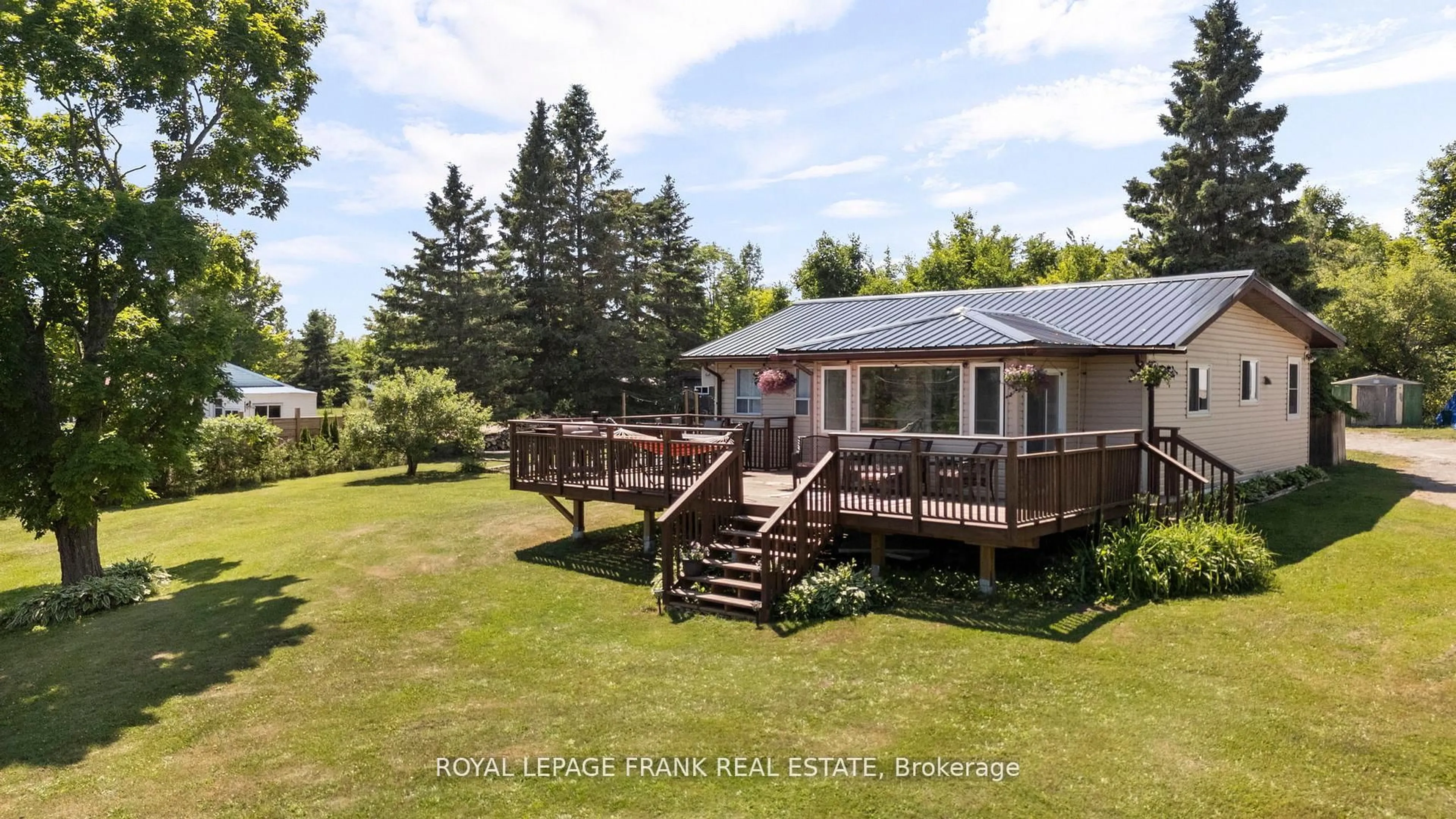A pic from outside/outdoor area/front of a property/back of a property/a pic from drone, water/lake/river/ocean view for 2378 Monck Rd, Kawartha Lakes Ontario K0M 2B0