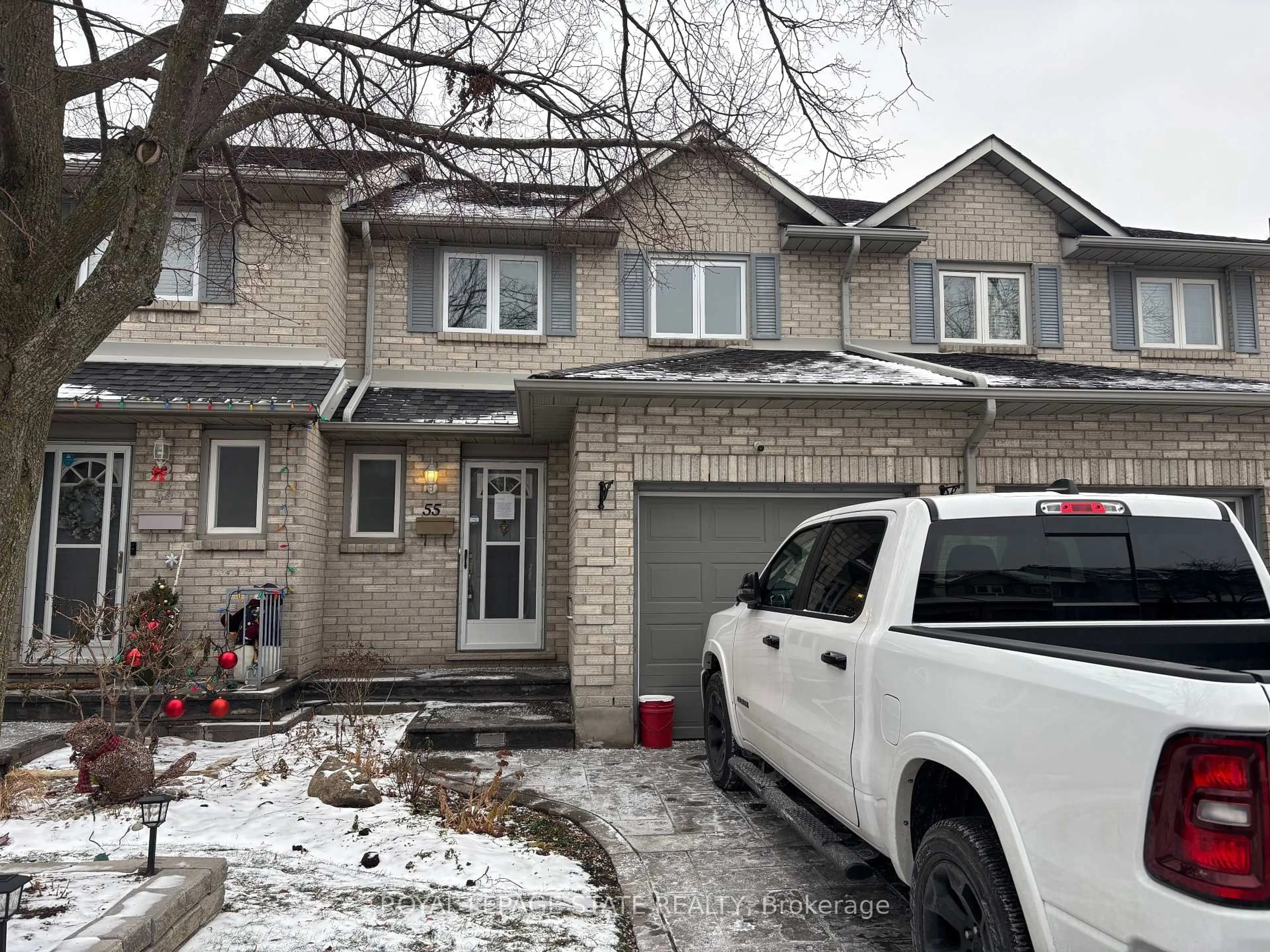 Home with brick exterior material, street for 1 Royalwood Crt #55, Hamilton Ontario L8E 4Y2