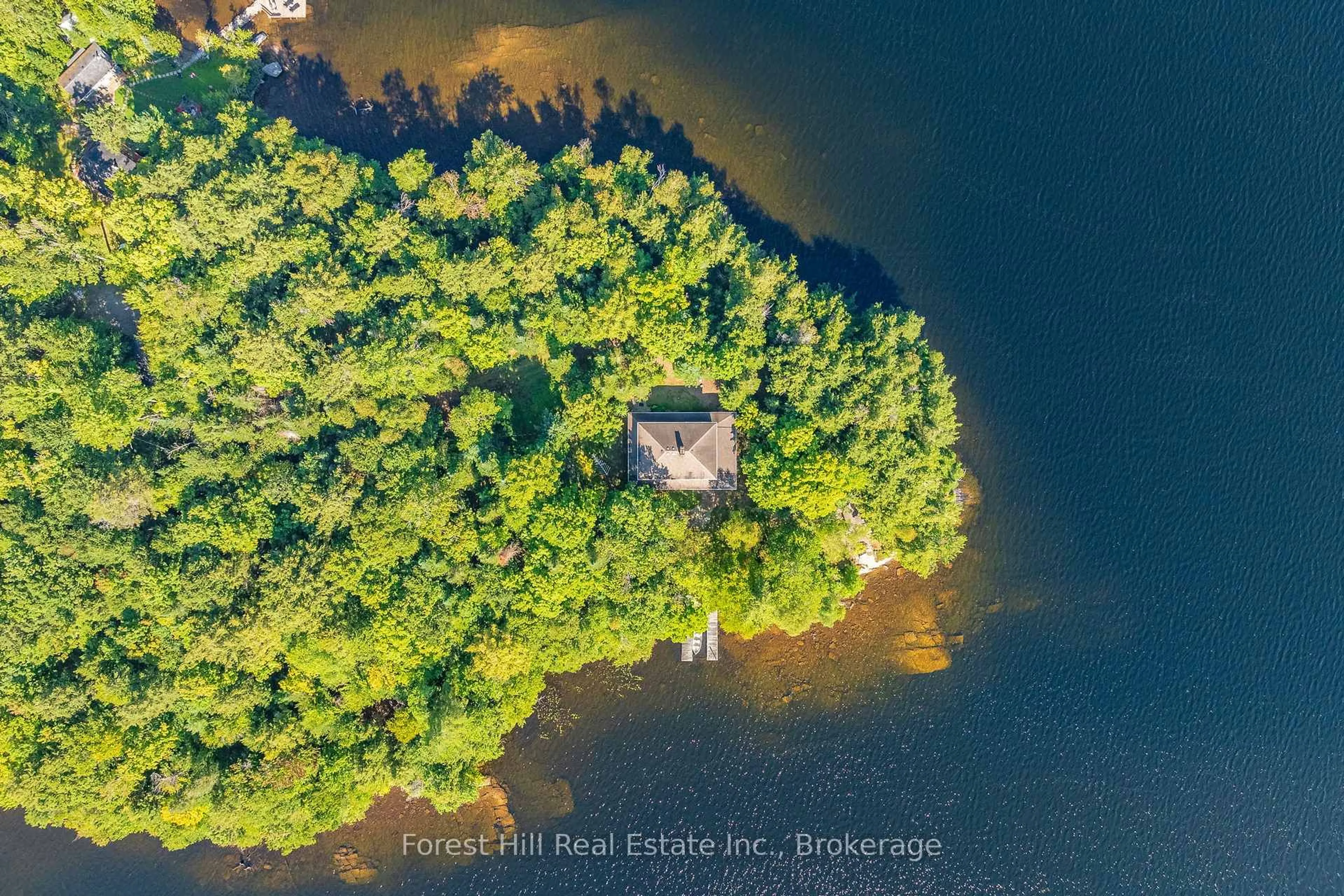 A pic from outside/outdoor area/front of a property/back of a property/a pic from drone, water/lake/river/ocean view for 1089 Lutes Lane, Algonquin Highlands Ontario P0A 1E0