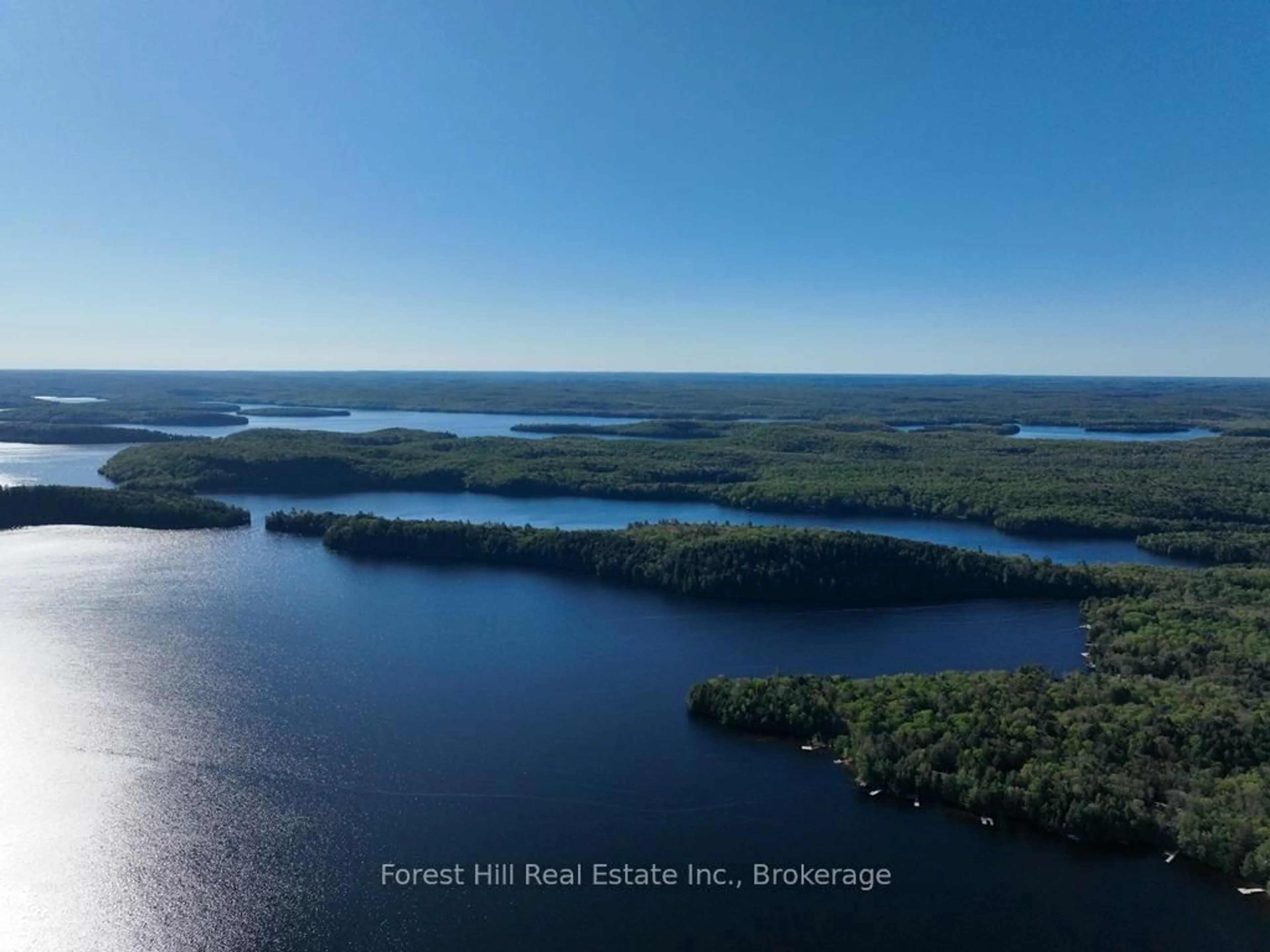 A pic from outside/outdoor area/front of a property/back of a property/a pic from drone, water/lake/river/ocean view for 1089 Lutes Lane, Algonquin Highlands Ontario P0A 1E0