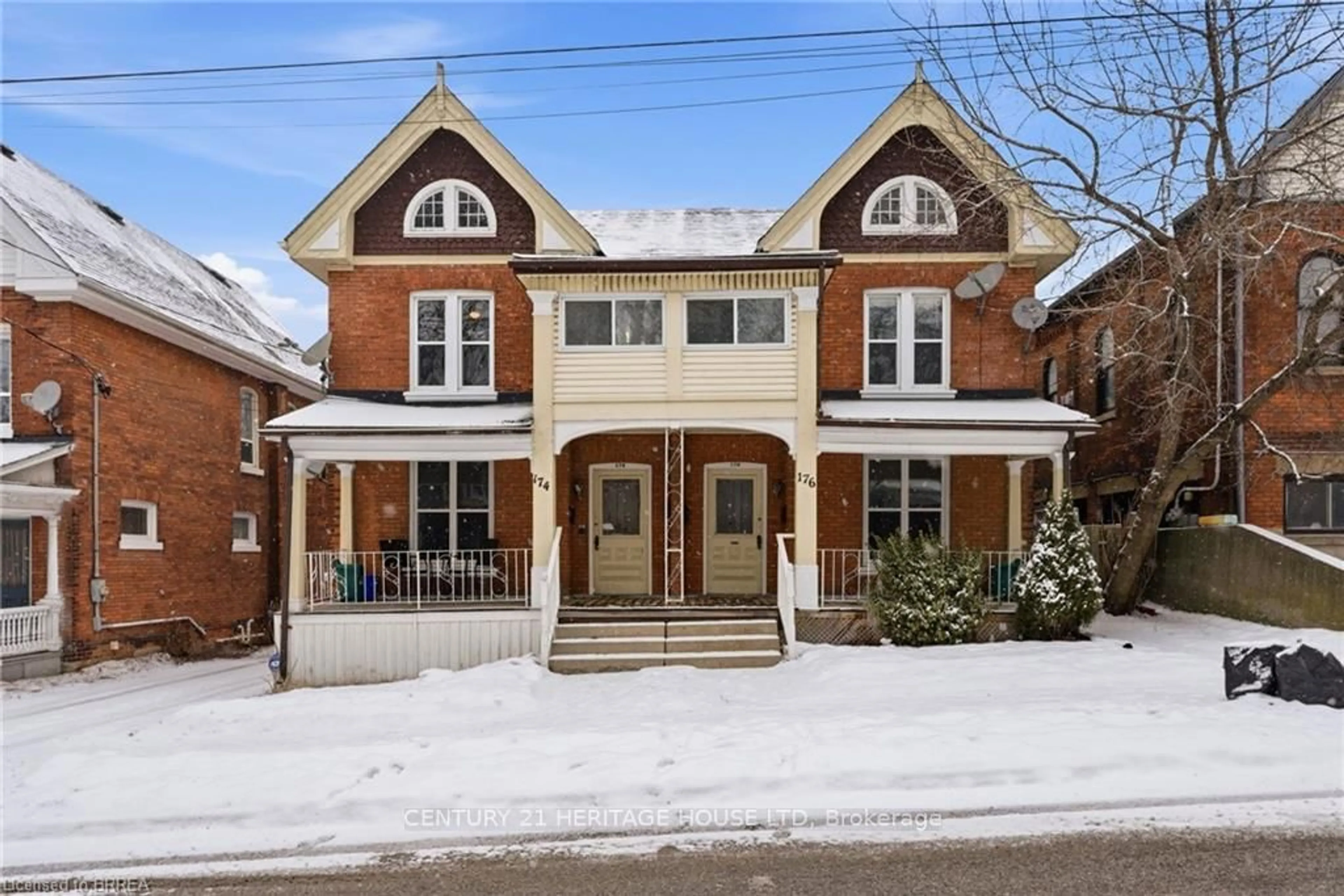 Home with brick exterior material, street for 174-176 Darling St, Brantford Ontario N3S 3W6