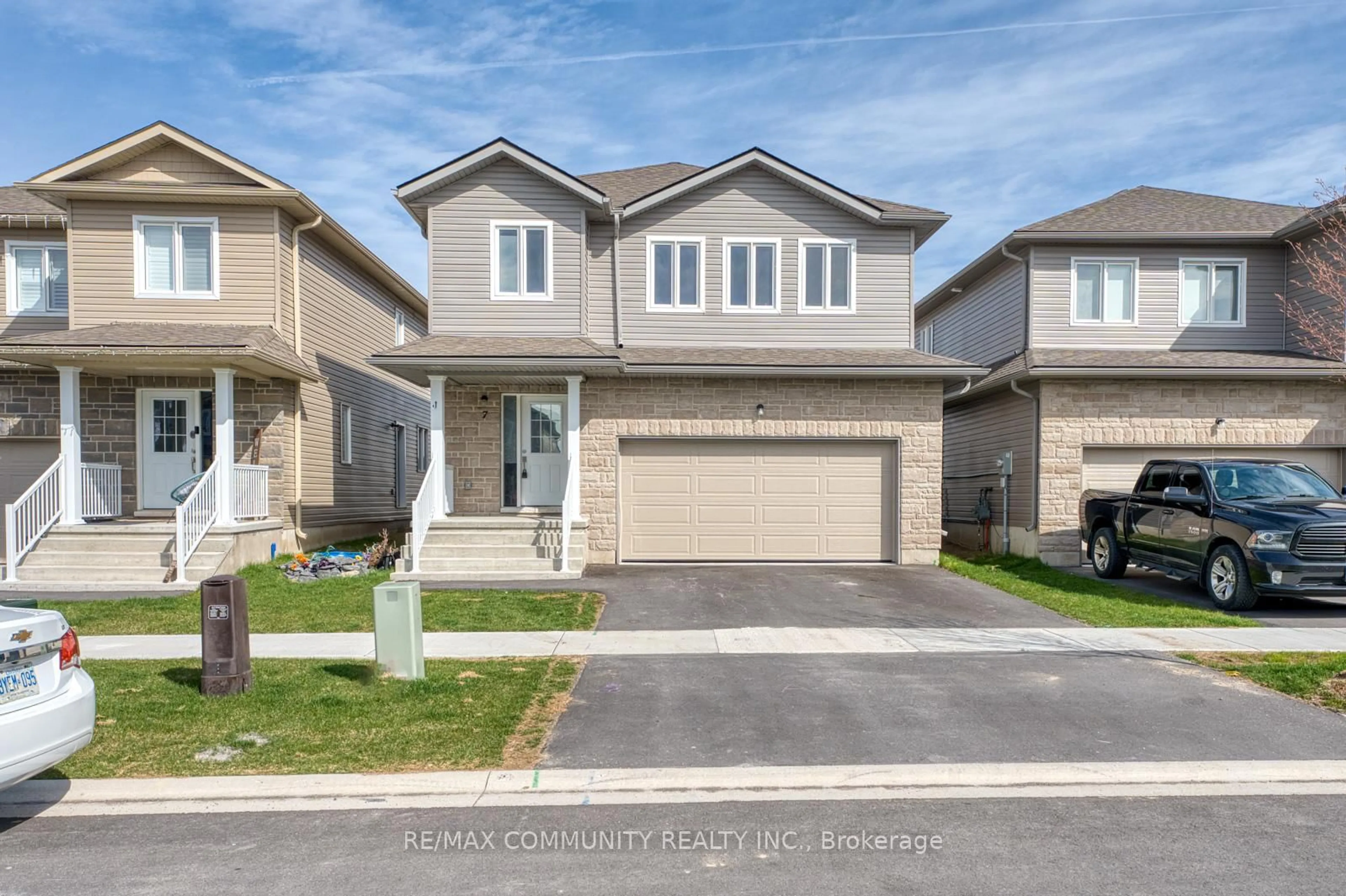 Home with vinyl exterior material, street for 7 Millcreek Dr, Bissett Creek Ontario K0H 2H0