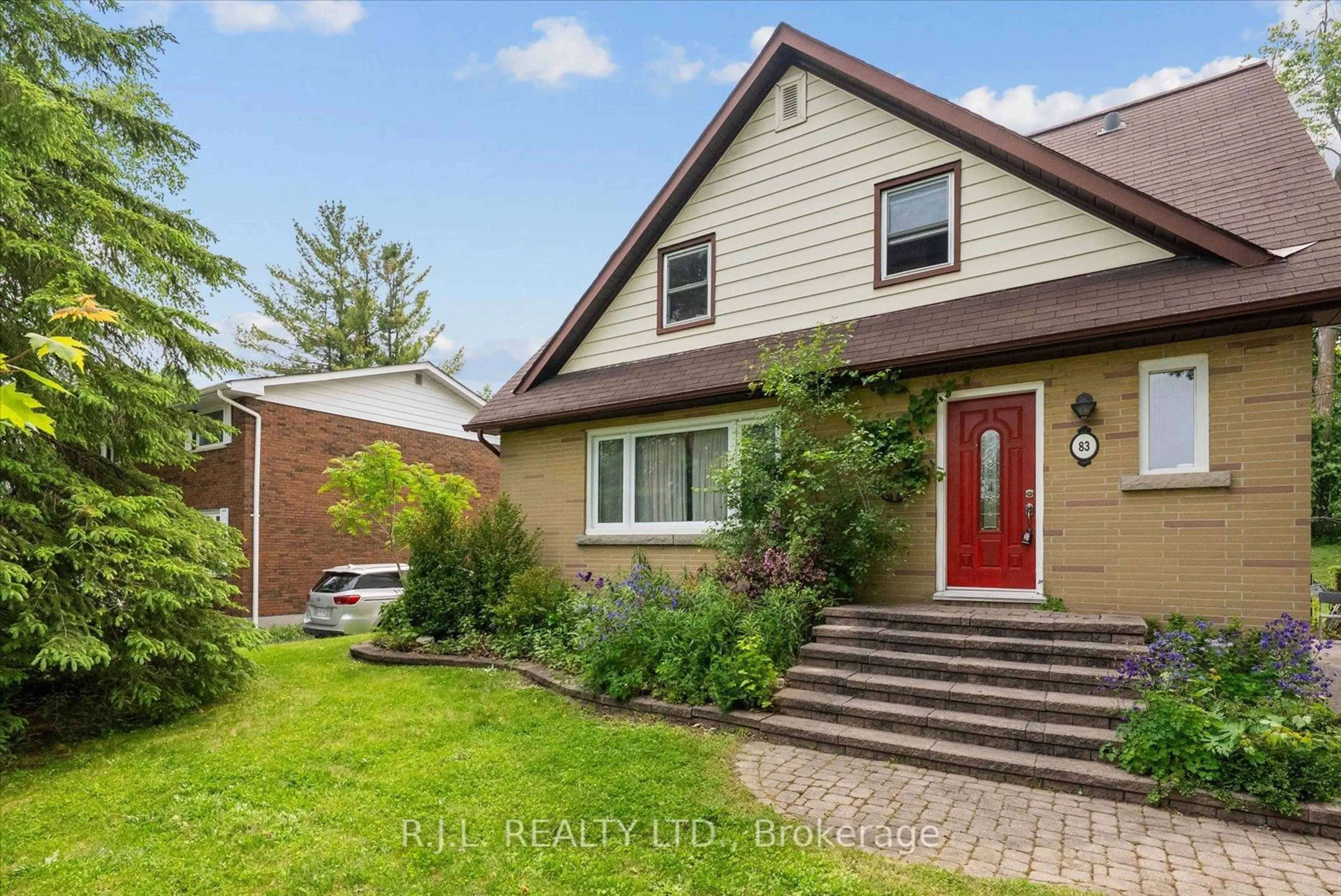 Home with brick exterior material, street for 83 Greenhill Dr, Peterborough Ontario K9J 6E2