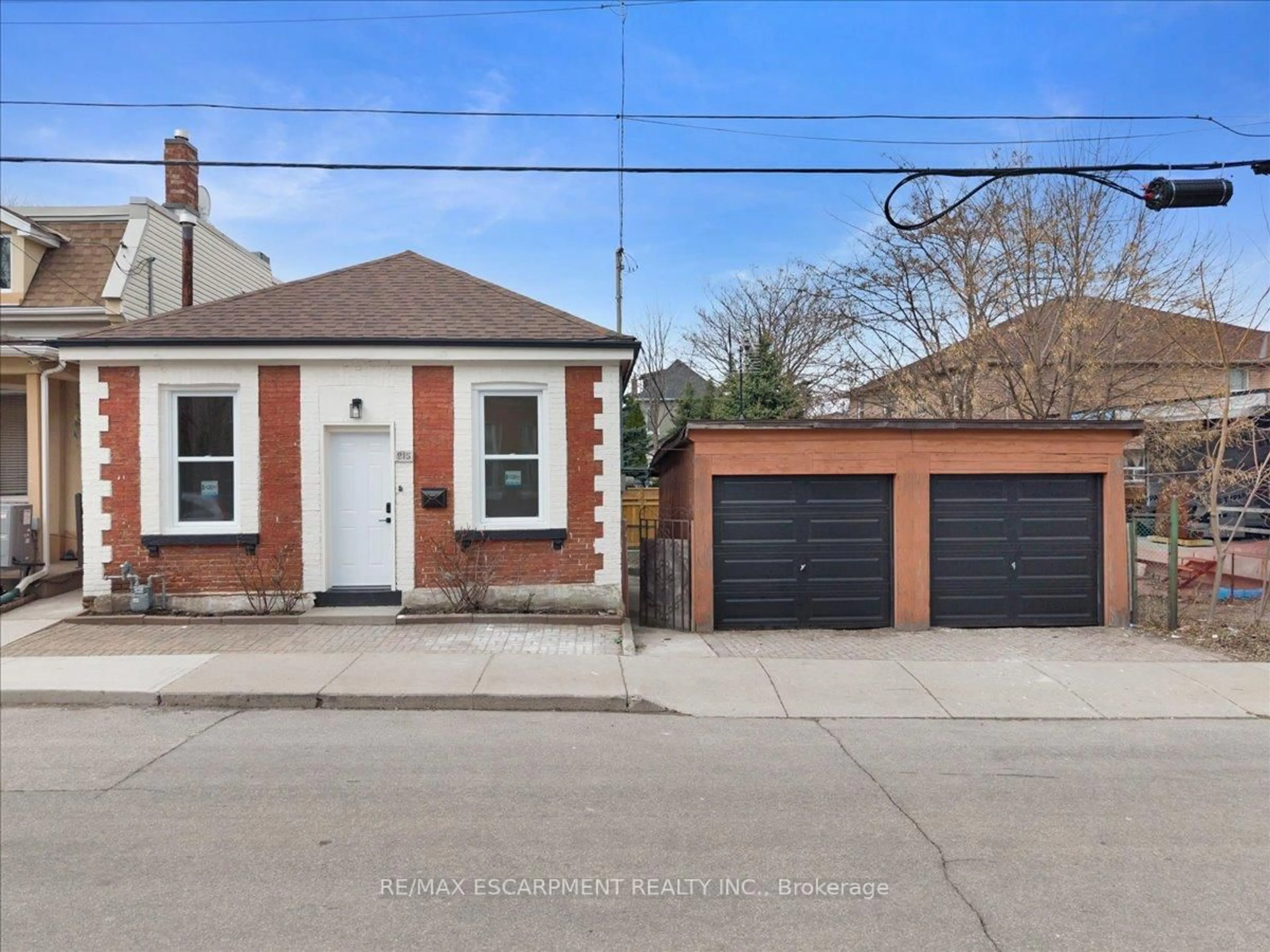 A pic from outside/outdoor area/front of a property/back of a property/a pic from drone, street for 215 Ray St, Hamilton Ontario L8R 2Y3