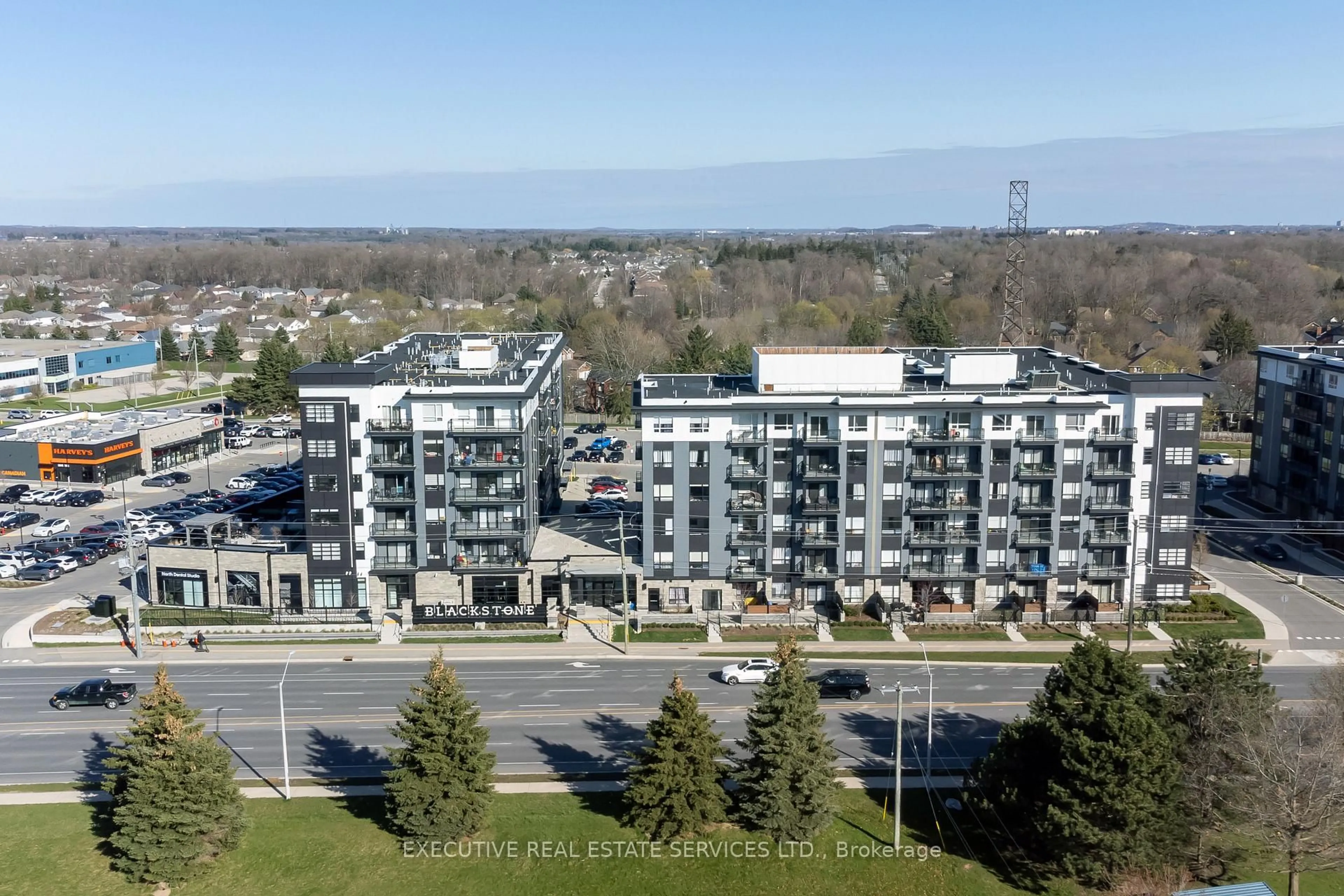A pic from outside/outdoor area/front of a property/back of a property/a pic from drone, unknown for 251 Northfield Dr #322, Waterloo Ontario N2K 0G9