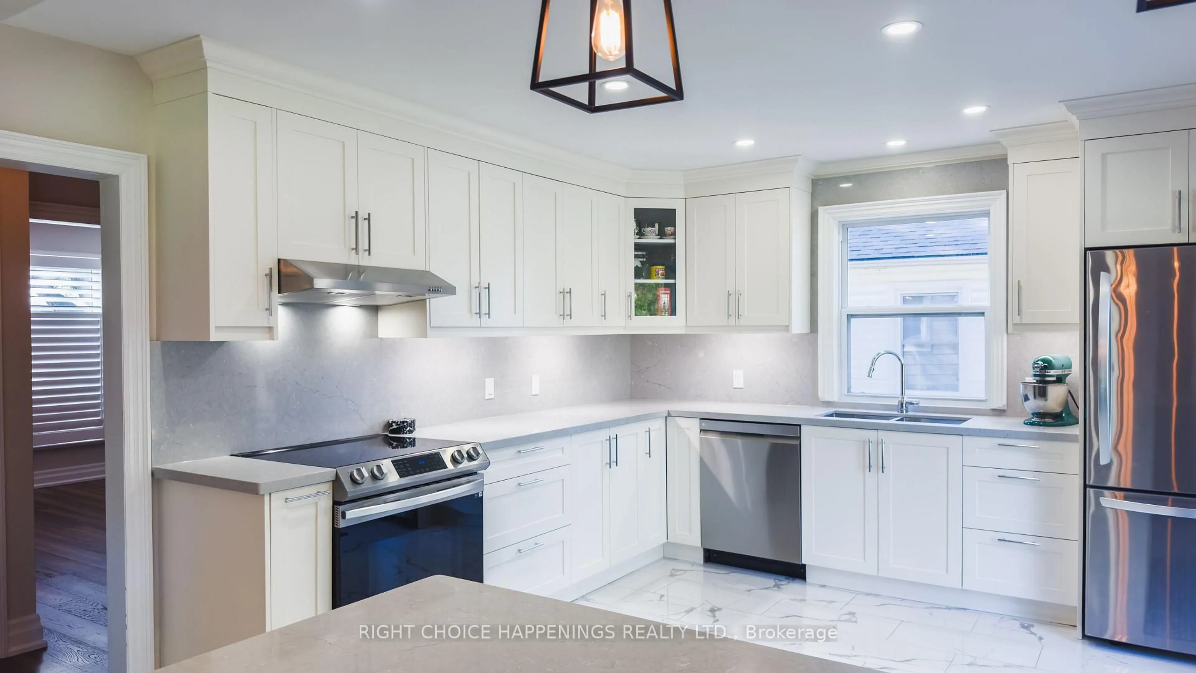 Open concept kitchen, ceramic/tile floor for 23 Heywood Ave, St. Catharines Ontario L2M 2M7