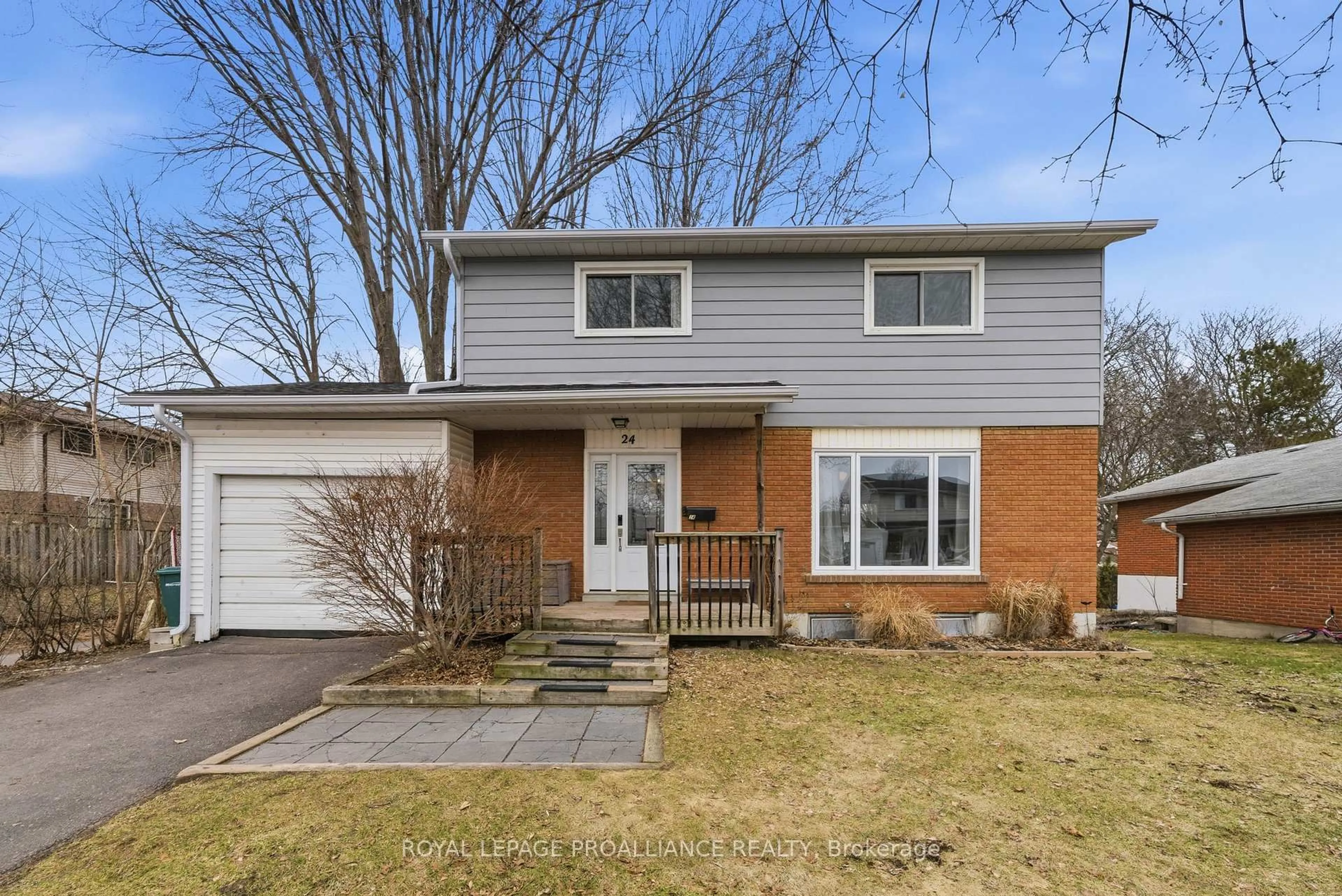 Home with vinyl exterior material, street for 24 Austin St, Quinte West Ontario K8V 1Z4