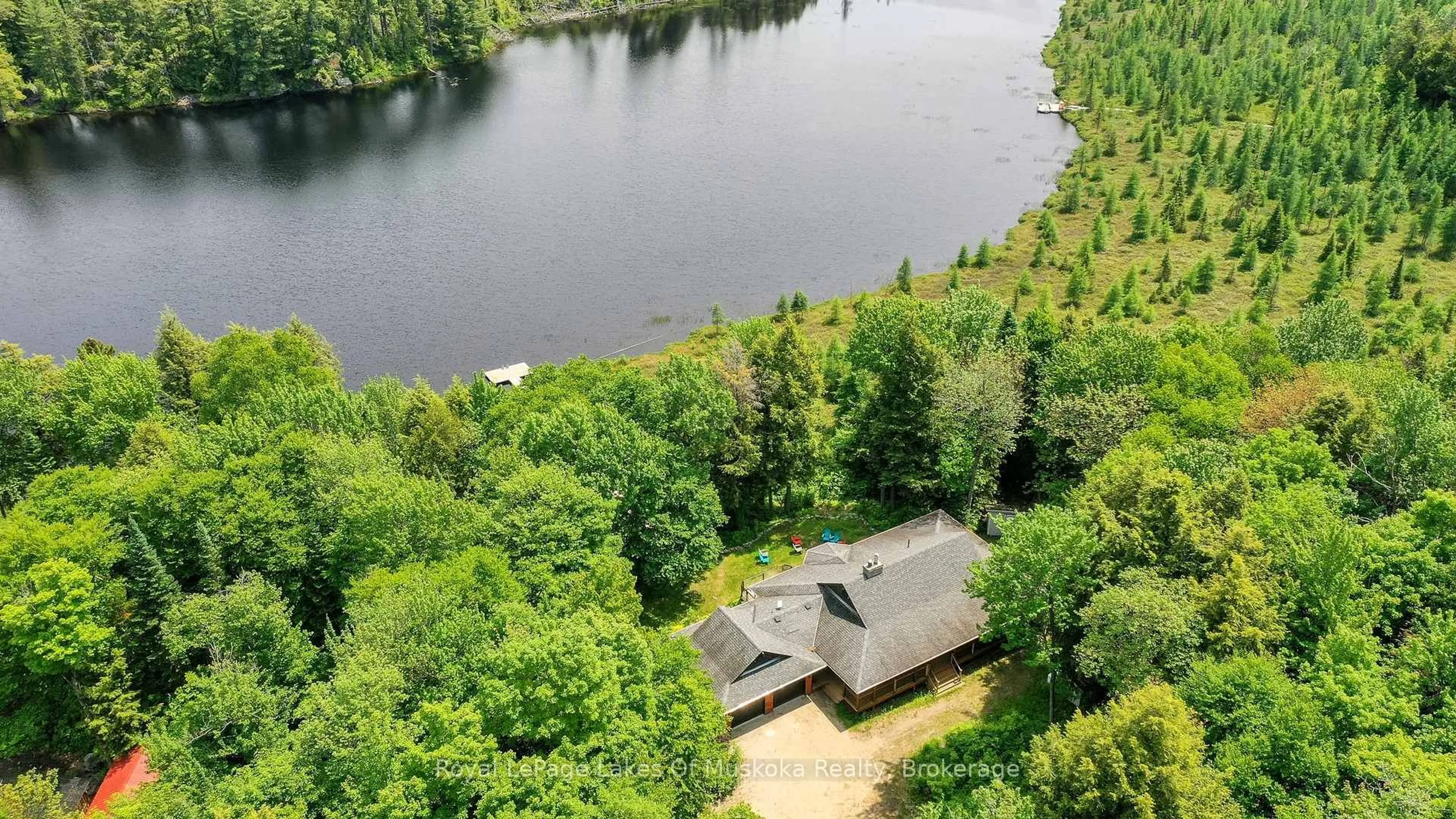 A pic from outside/outdoor area/front of a property/back of a property/a pic from drone, water/lake/river/ocean view for 1420 Limberlost Rd, Lake of Bays Ontario P1H 2J6