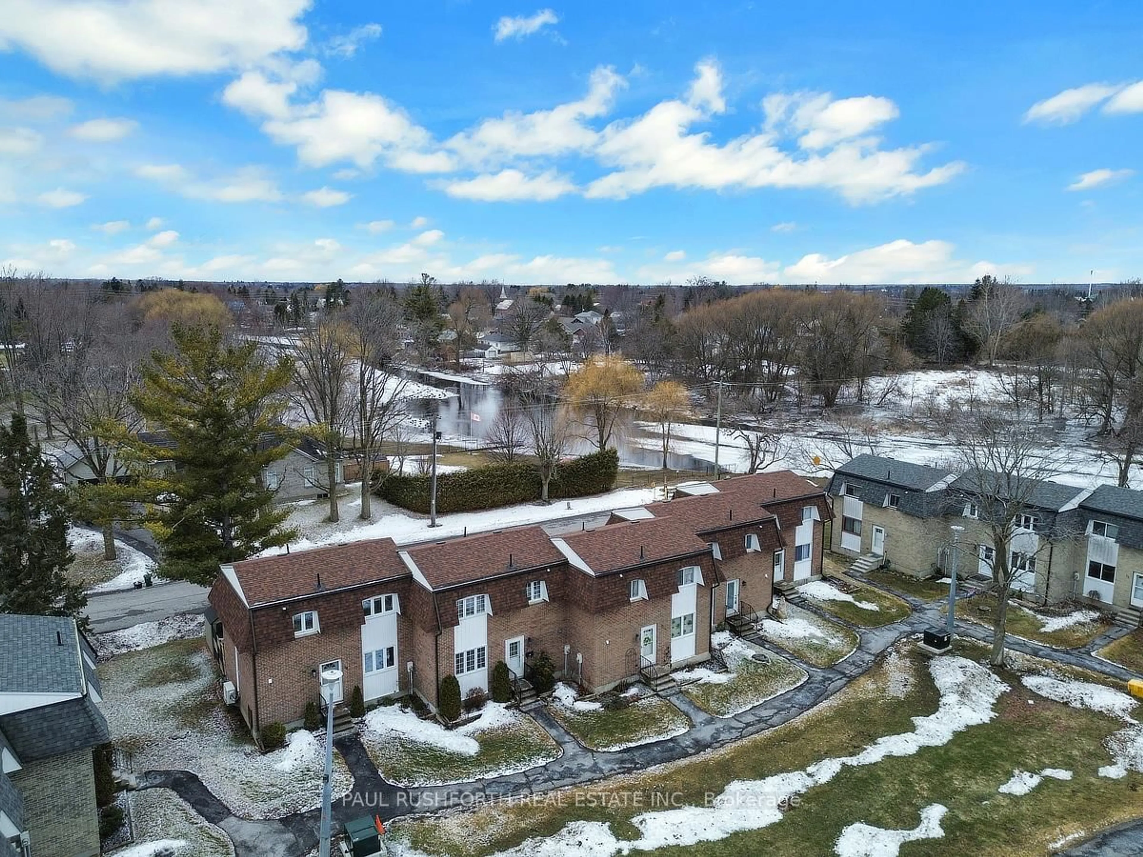 A pic from outside/outdoor area/front of a property/back of a property/a pic from drone, unknown for 68 King St #15, Richmond Ontario K0A 2Z0