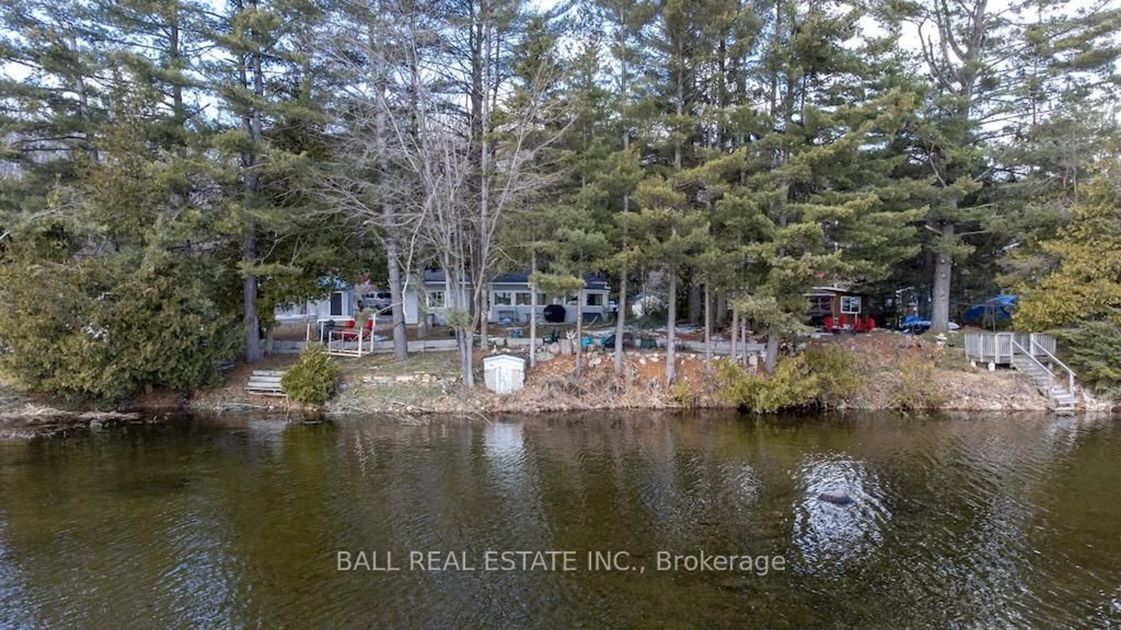 A pic from outside/outdoor area/front of a property/back of a property/a pic from drone, water/lake/river/ocean view for 2077 White Lake Rd, Douro-Dummer Ontario K0L 2H0