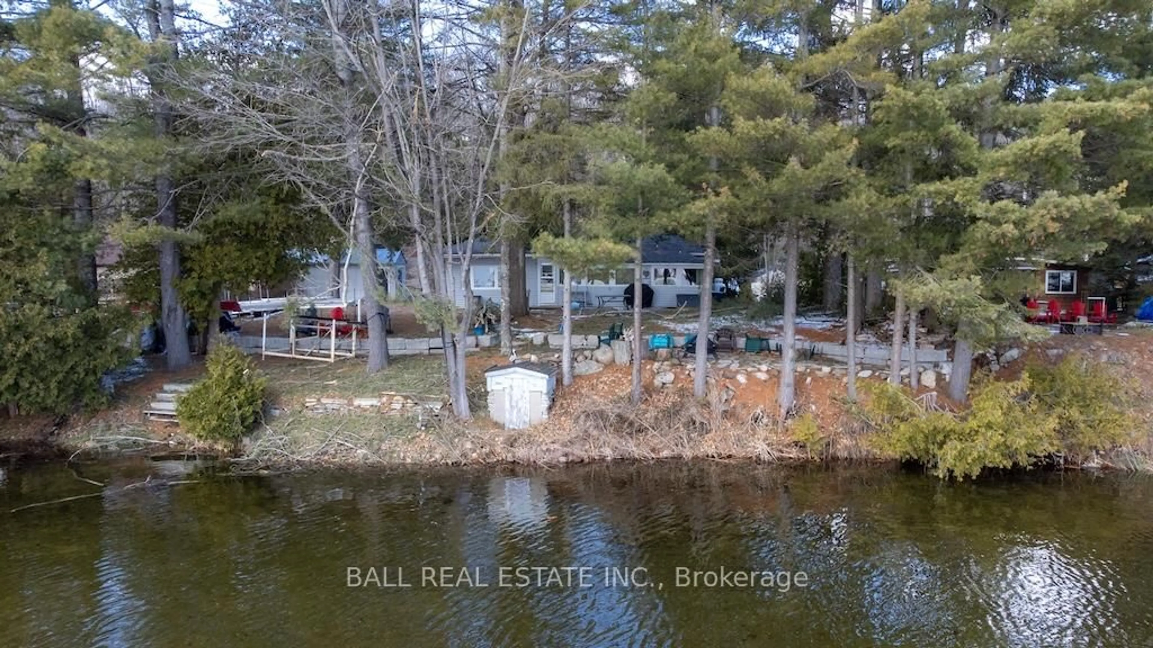 A pic from outside/outdoor area/front of a property/back of a property/a pic from drone, water/lake/river/ocean view for 2077 White Lake Rd, Douro-Dummer Ontario K0L 2H0
