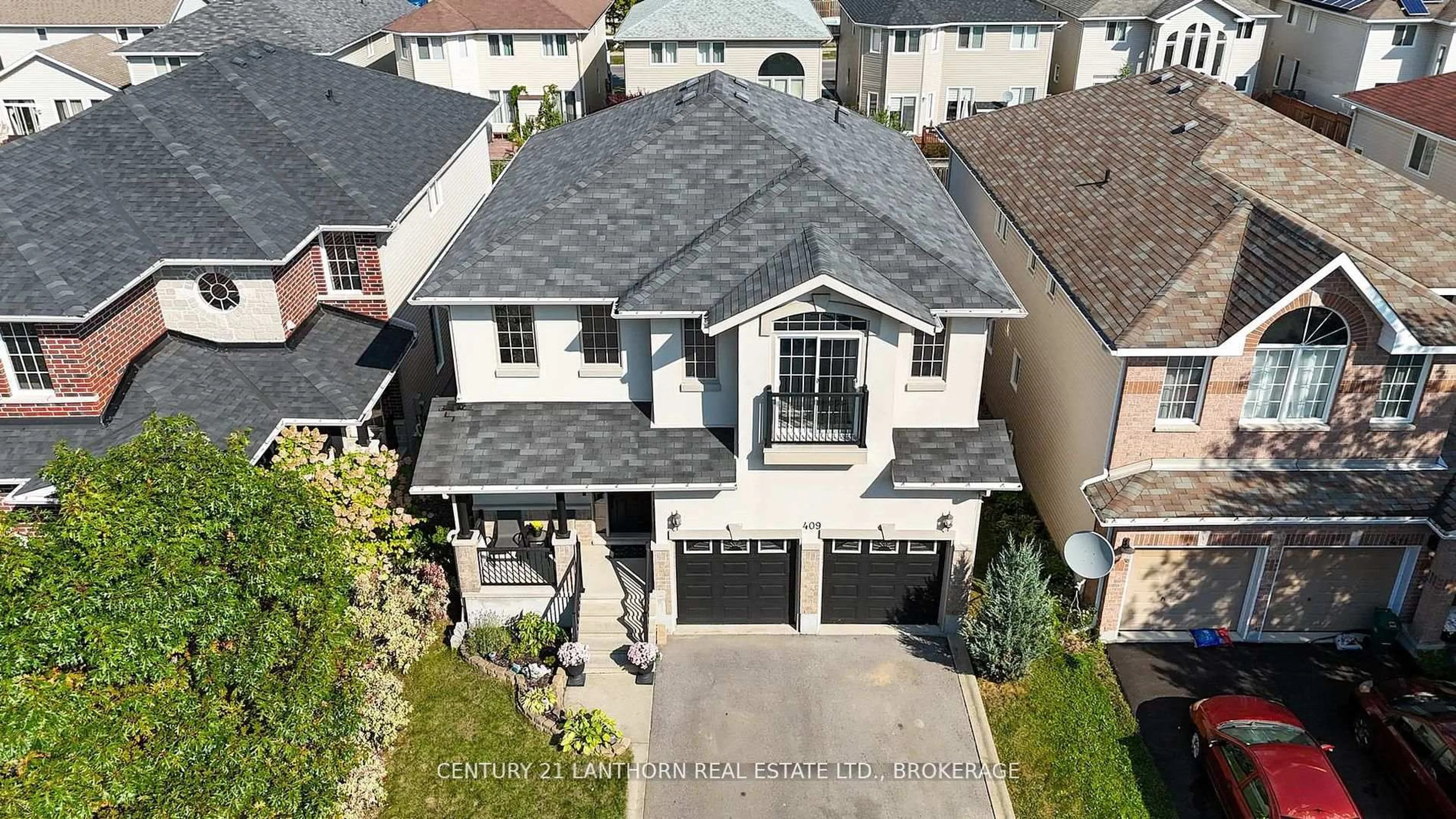 A pic from outside/outdoor area/front of a property/back of a property/a pic from drone, street for 409 Cavendish Cres, Kingston Ontario K7P 0E7