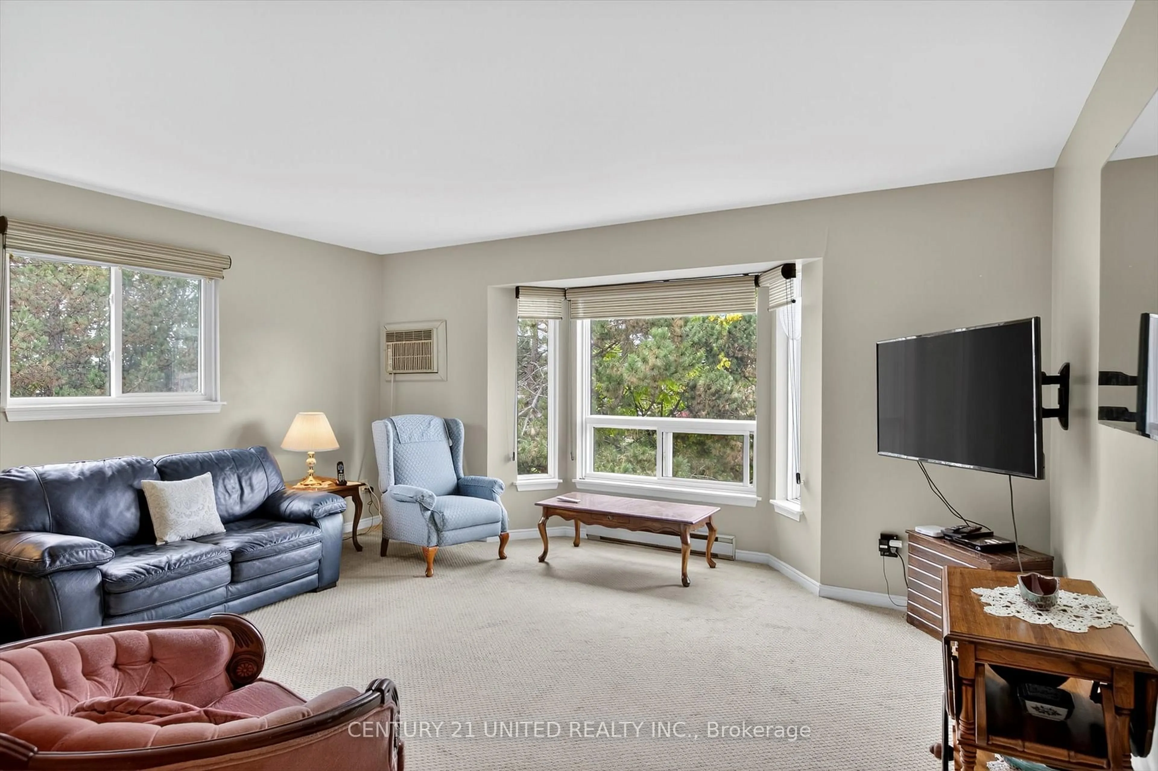 Living room with furniture, unknown for 2020 Mapleridge Dr #303, Peterborough Ontario K9K 1W2