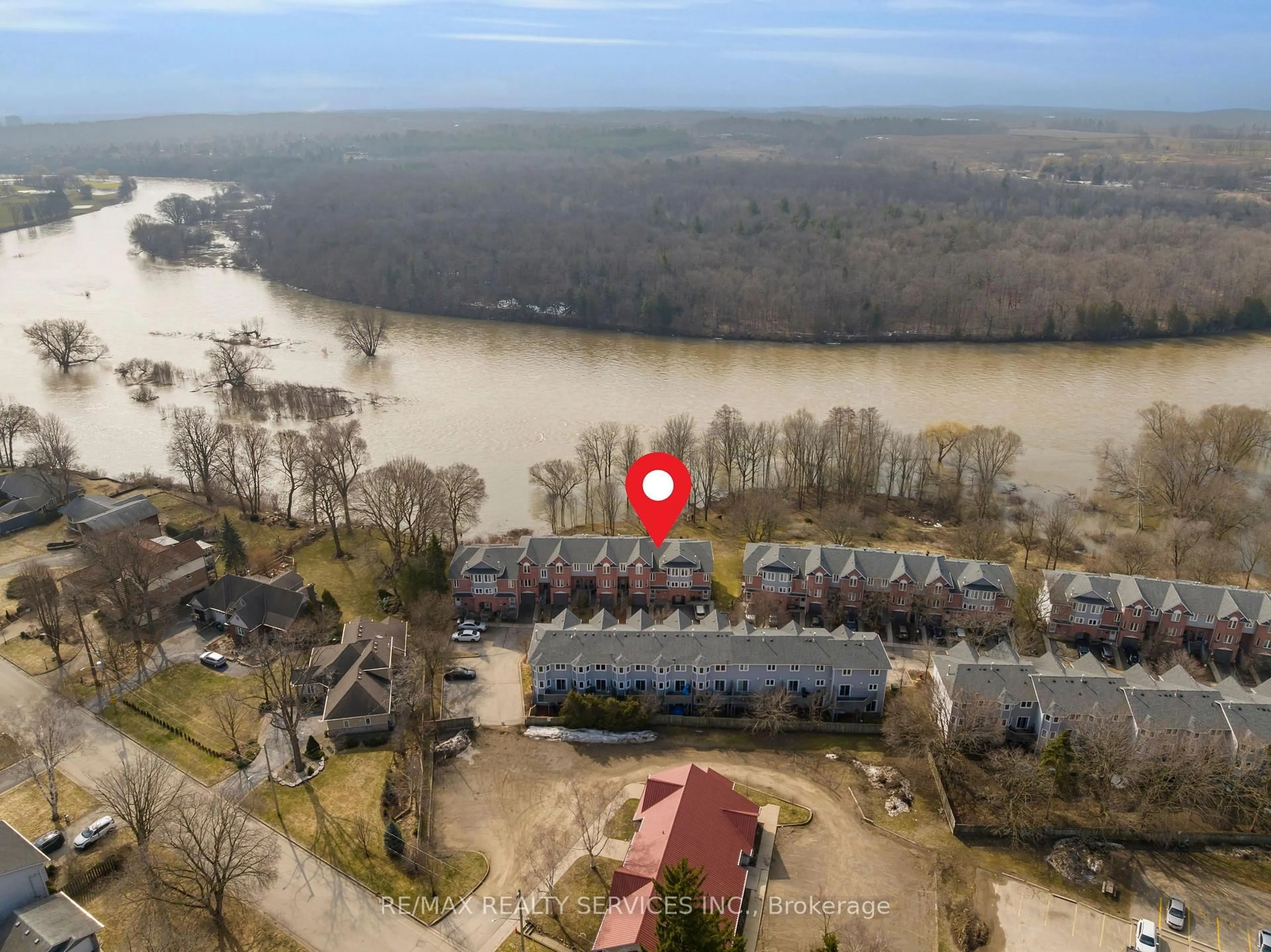A pic from outside/outdoor area/front of a property/back of a property/a pic from drone, water/lake/river/ocean view for 245 Bishop St #9, Cambridge Ontario N3H 5N2