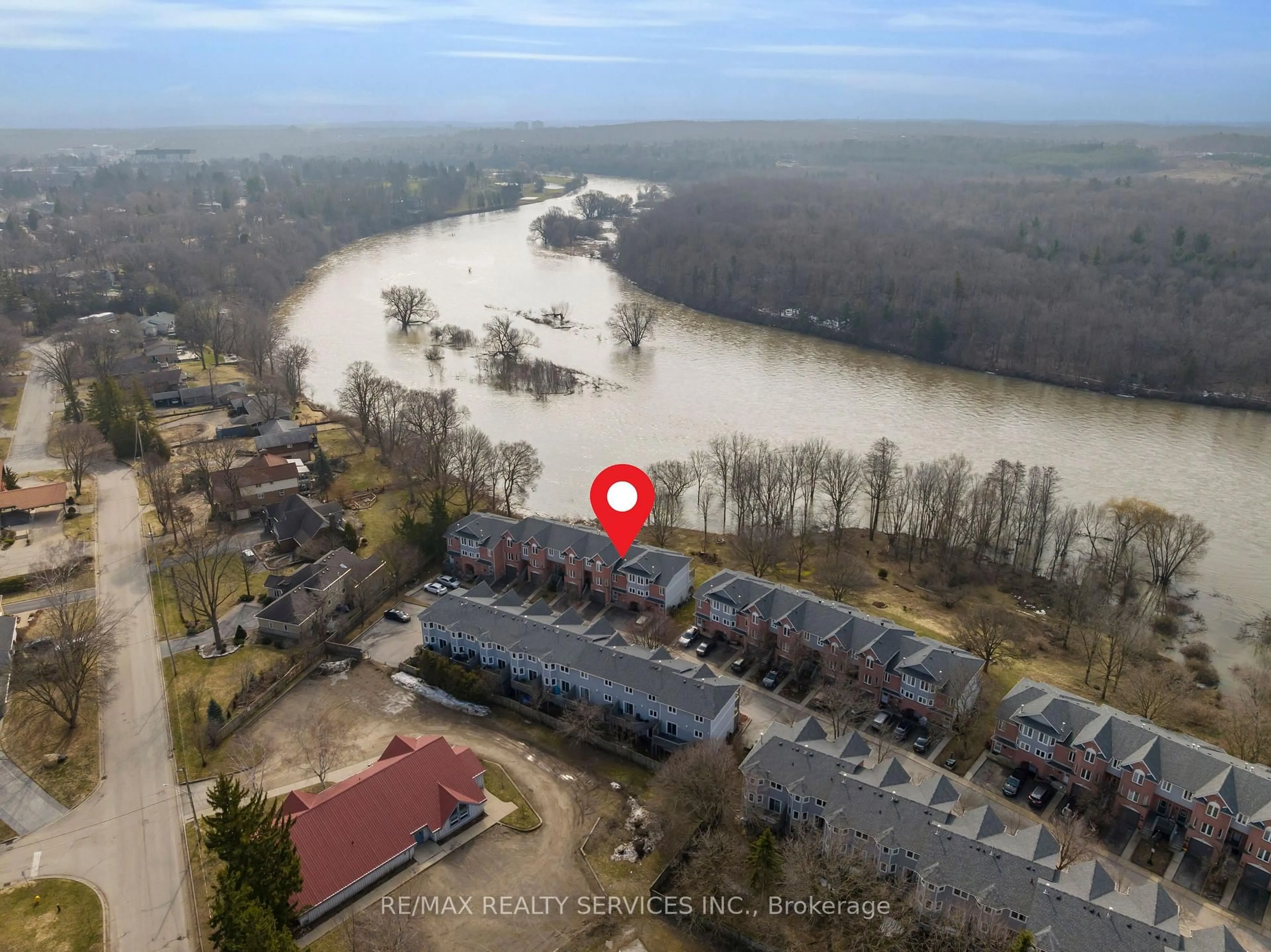 A pic from outside/outdoor area/front of a property/back of a property/a pic from drone, water/lake/river/ocean view for 245 Bishop St #9, Cambridge Ontario N3H 5N2