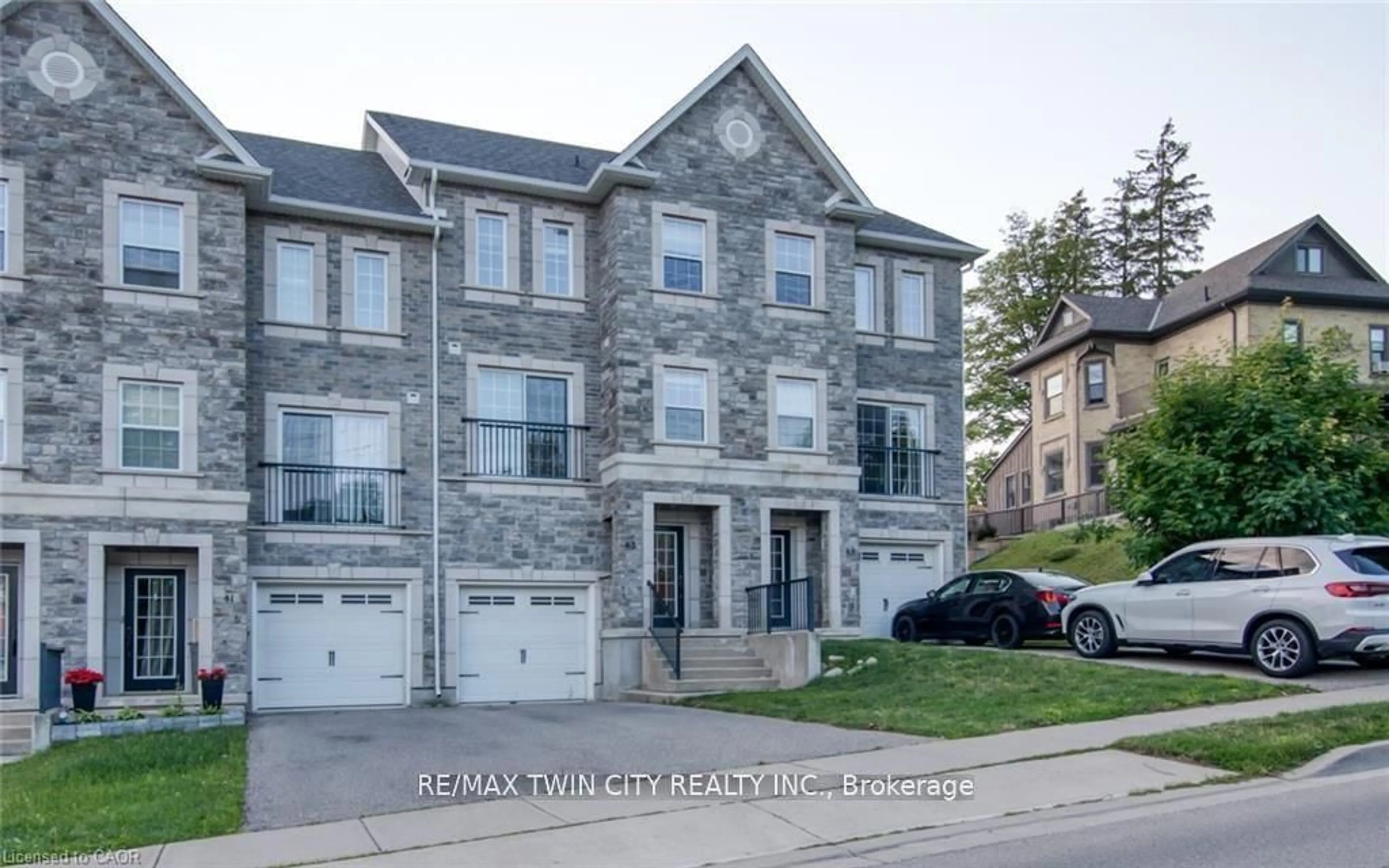 Home with brick exterior material, street for 43 Woolwich St, Kitchener Ontario N2K 1S2
