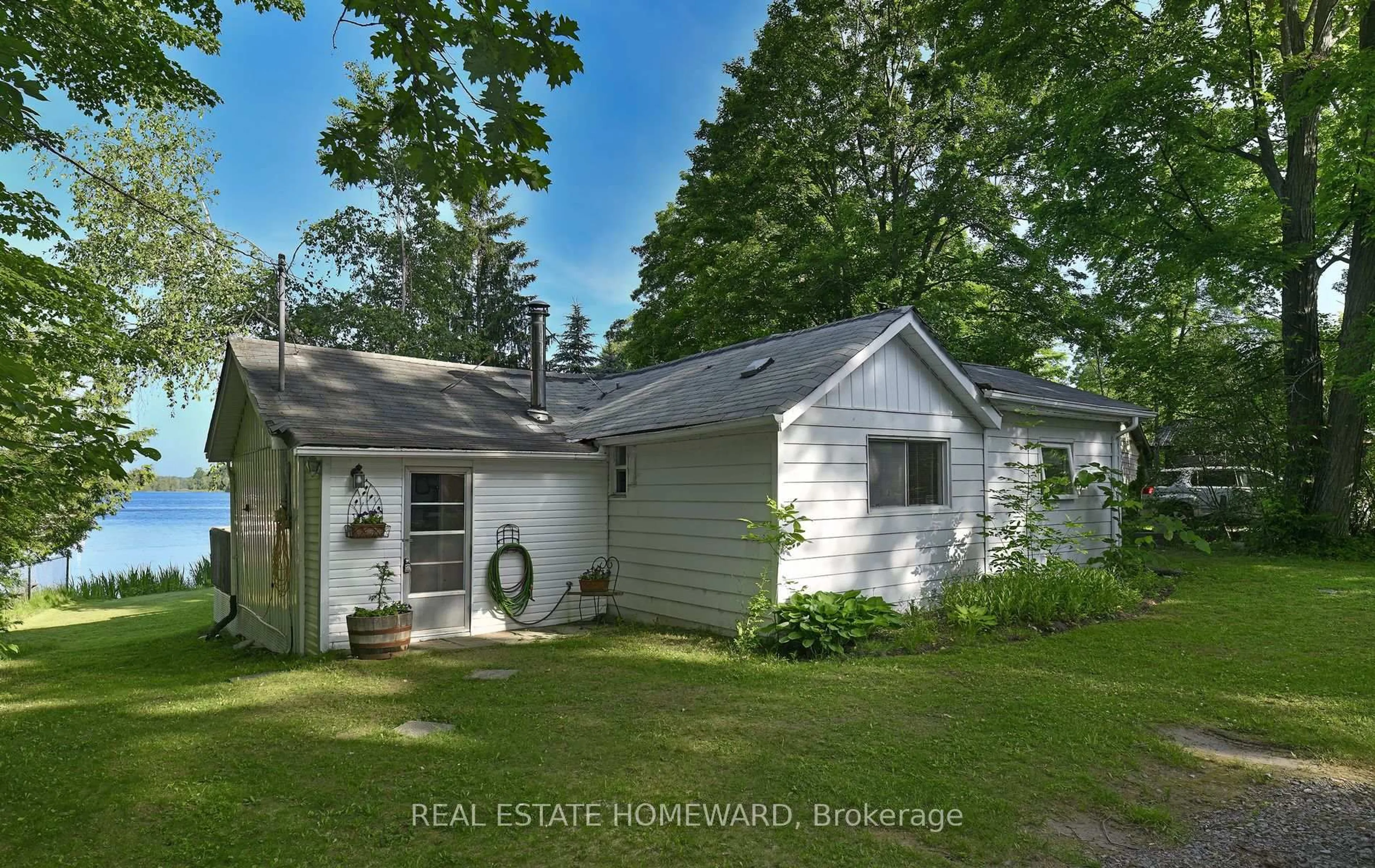 Home with vinyl exterior material, street for 260 South Shores Rd, Trent Hills Ontario K0L 1L0