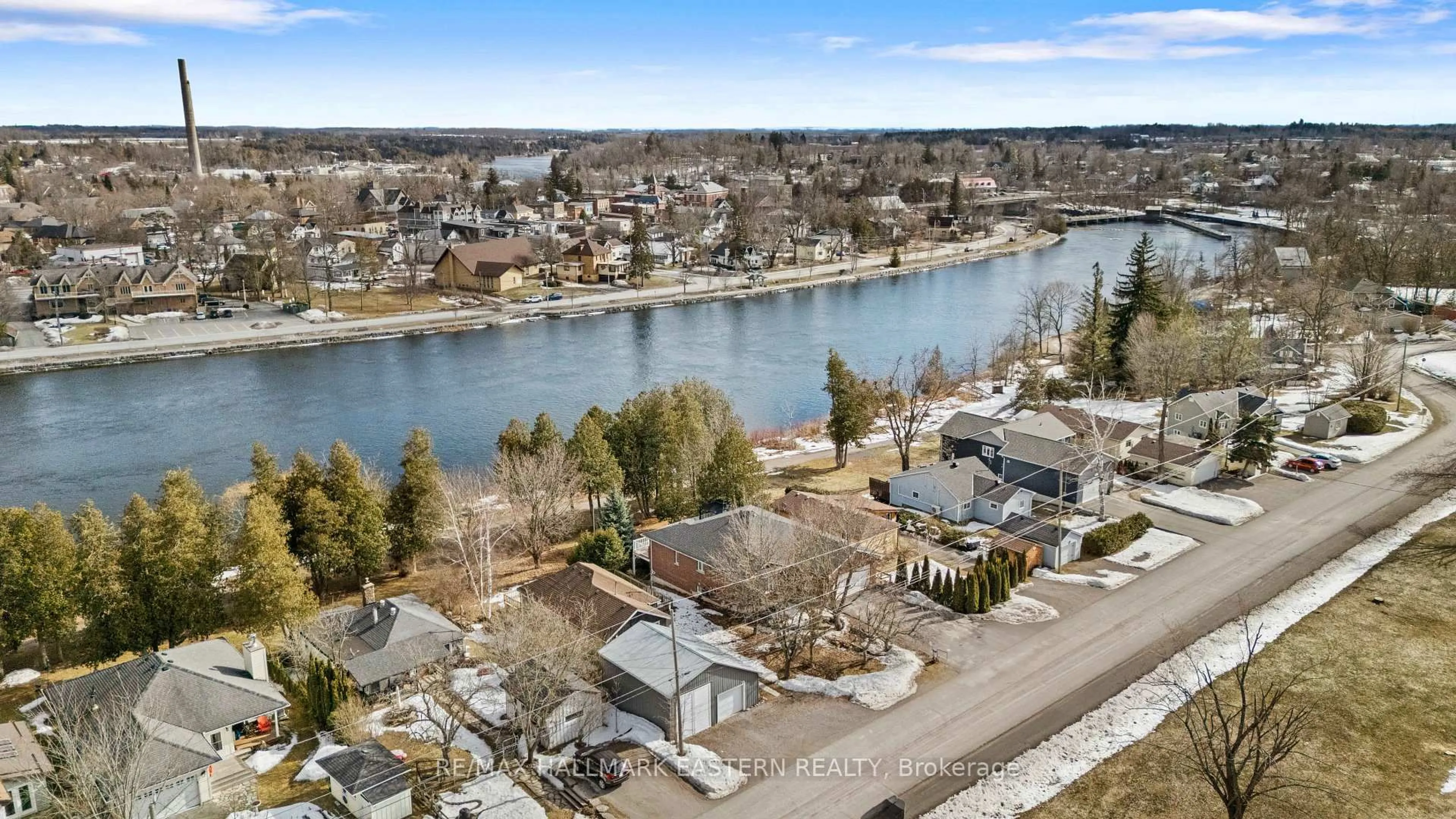 A pic from outside/outdoor area/front of a property/back of a property/a pic from drone, water/lake/river/ocean view for 13 Hague Blvd, Selwyn Ontario K0L 2H0