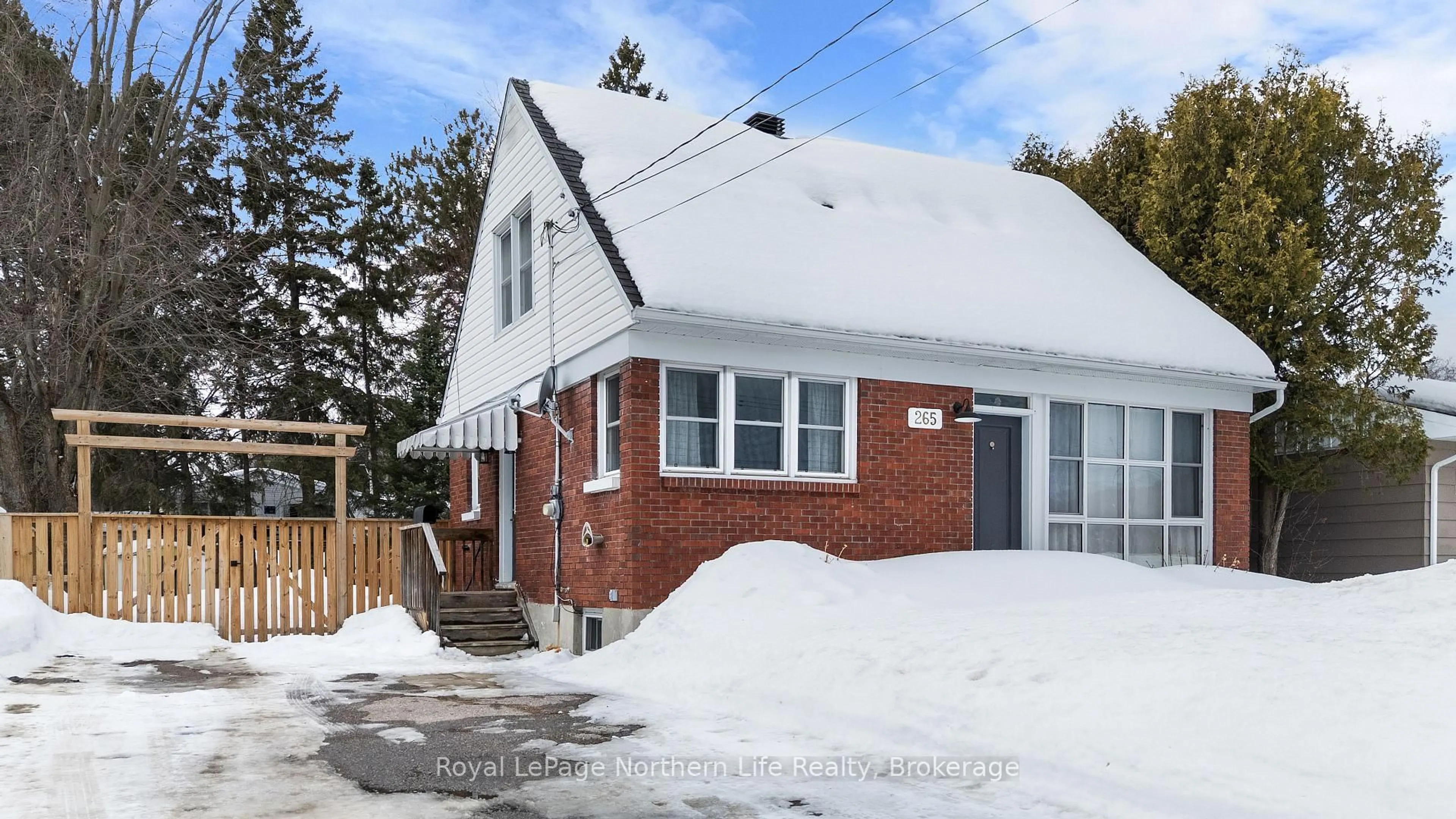 Home with brick exterior material, street for 265 Lakeside Dr, North Bay Ontario P1A 3E2
