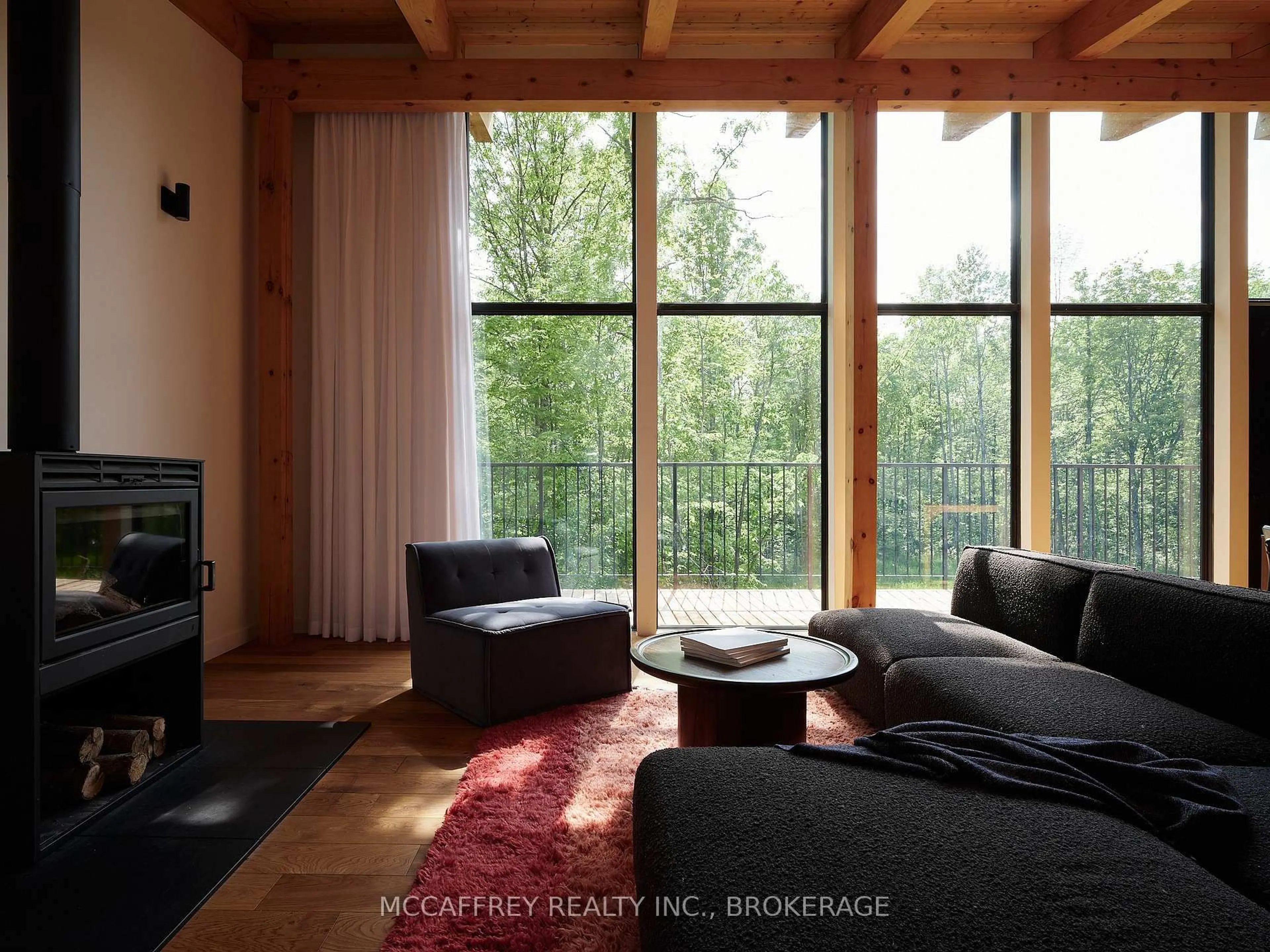 Living room with furniture, wood/laminate floor for 962 Church Rd, Kaladar Ontario K0K 1Z0