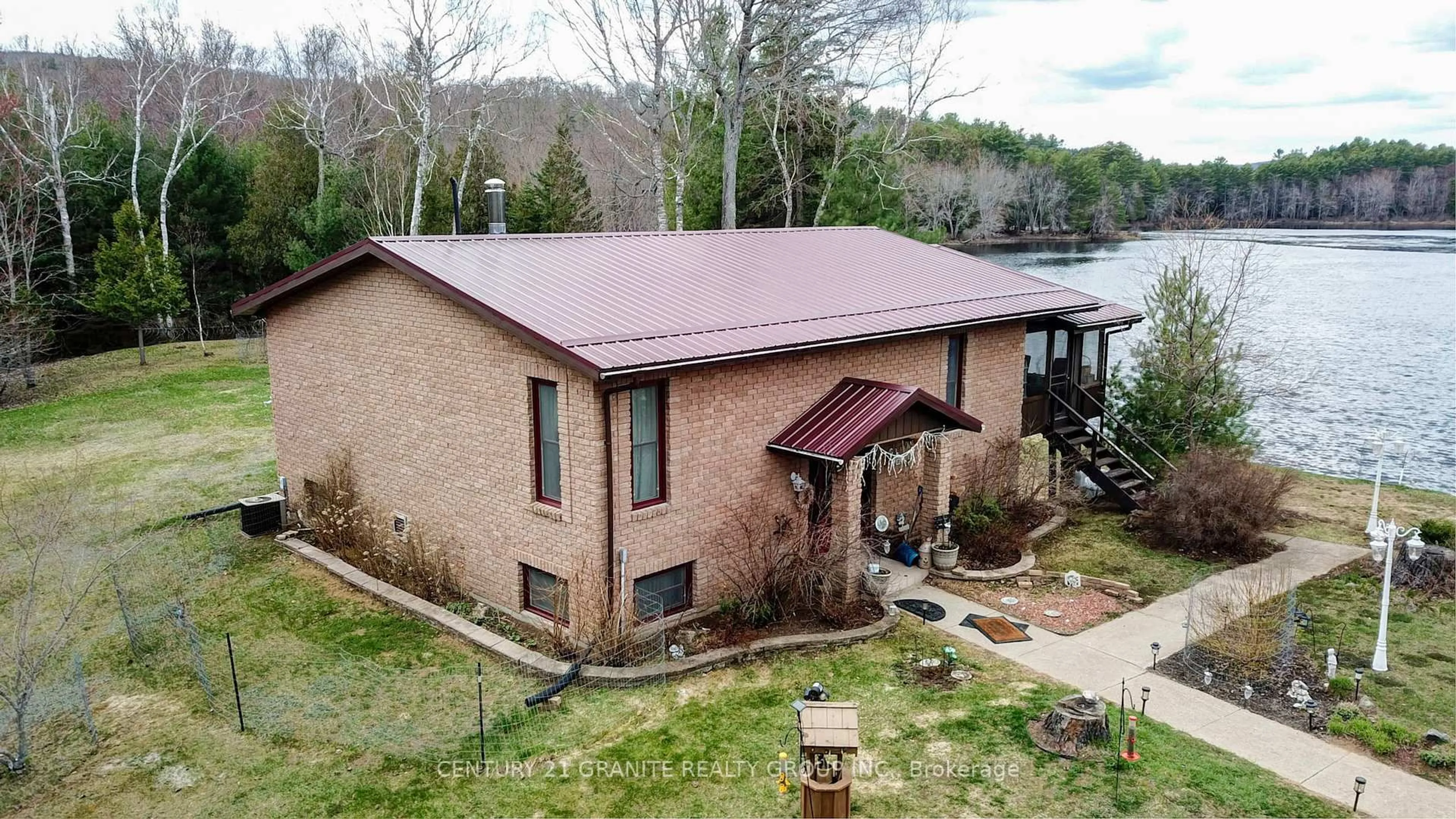 A pic from outside/outdoor area/front of a property/back of a property/a pic from drone, water/lake/river/ocean view for 230 RIVER BEND Dr, Palmer Rapids Ontario K0J 2E0