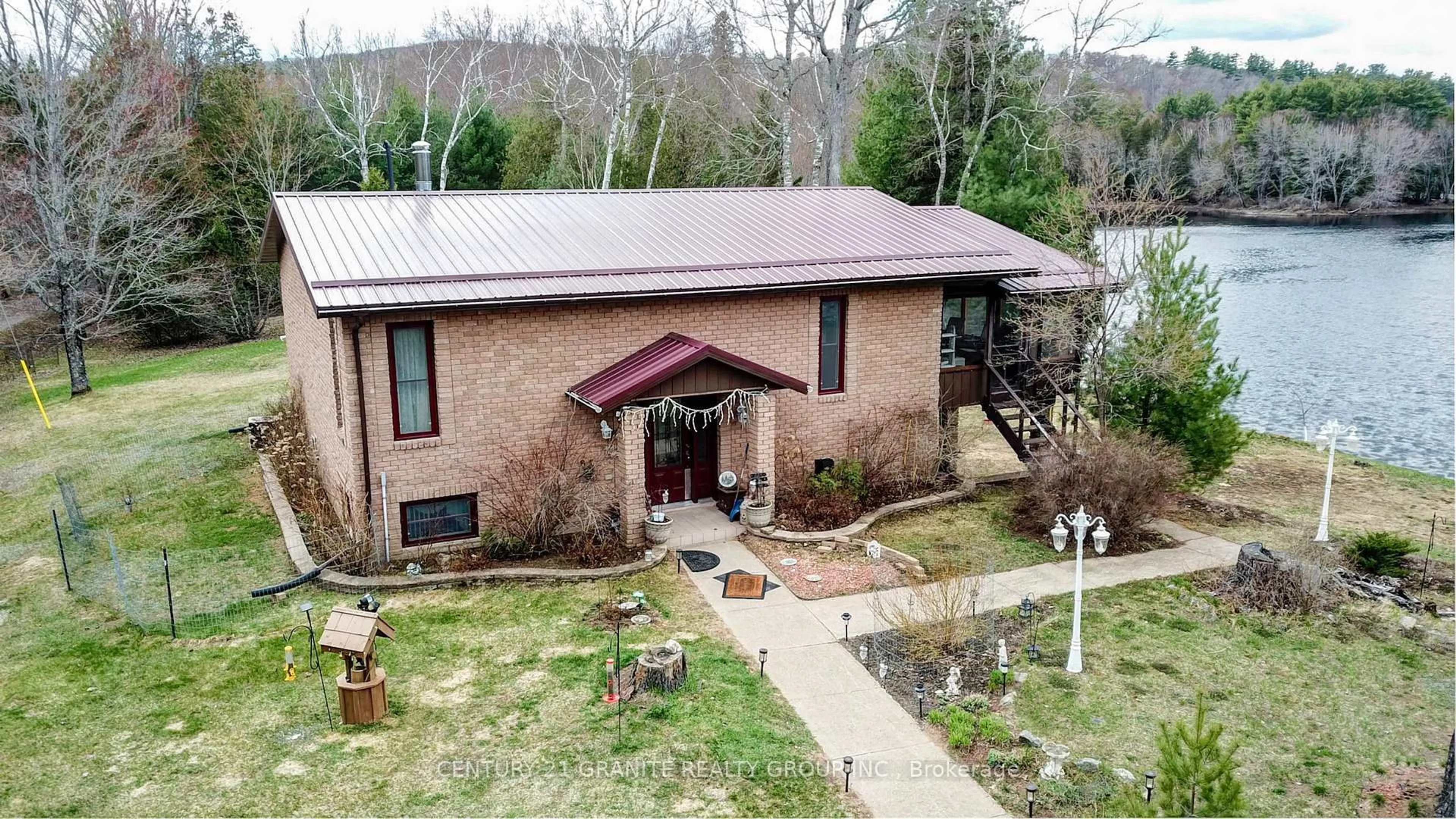 A pic from outside/outdoor area/front of a property/back of a property/a pic from drone, unknown for 230 RIVER BEND Dr, Palmer Rapids Ontario K0J 2E0